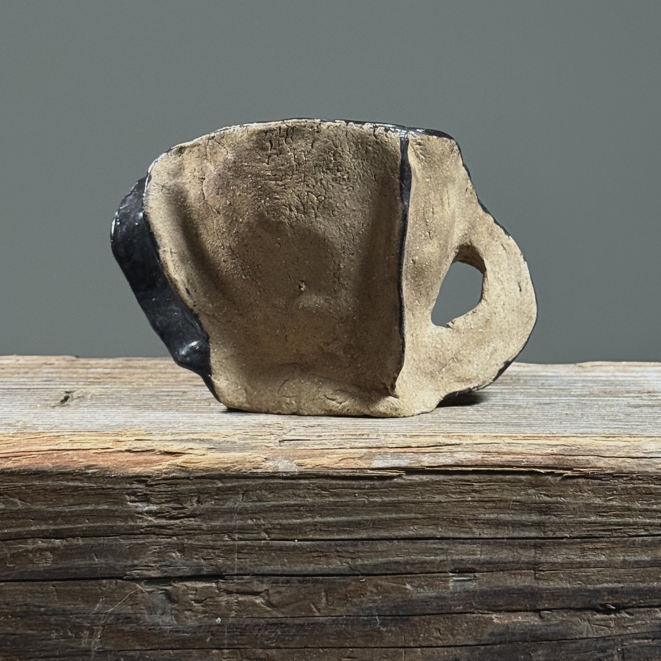 Coffee cup. Abstract decoration. Modernist form.