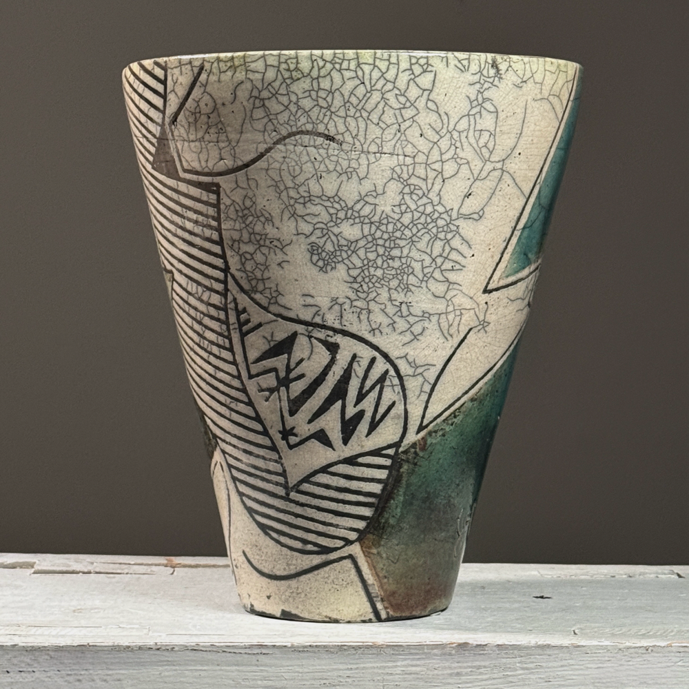 Full view of vintage 1984 postmodernist raku crackle glaze ceramic vessel, signed on side, blue-green glaze areas and black line detail