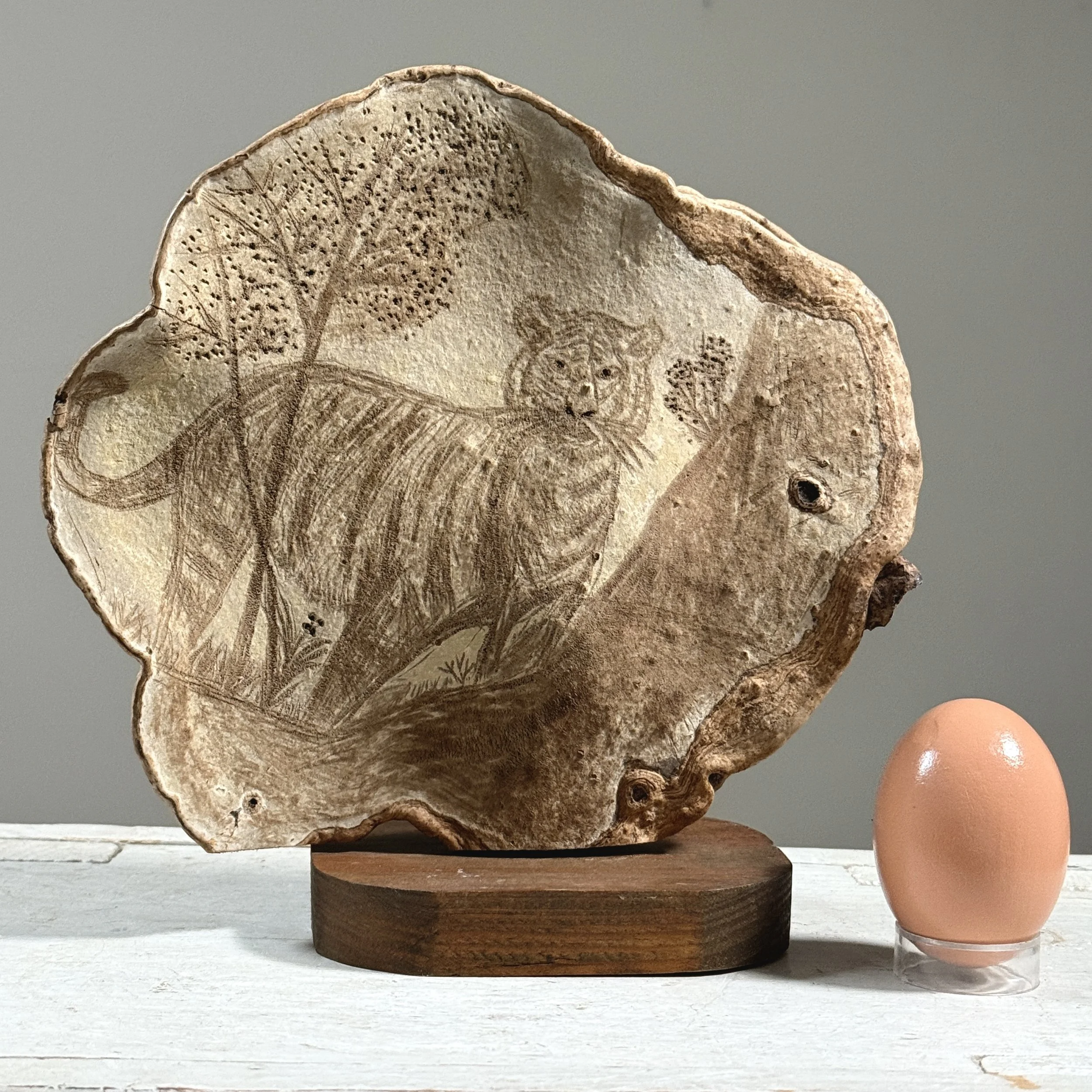 Antique folk art carved tiger on a shelf mushroom with custom stand