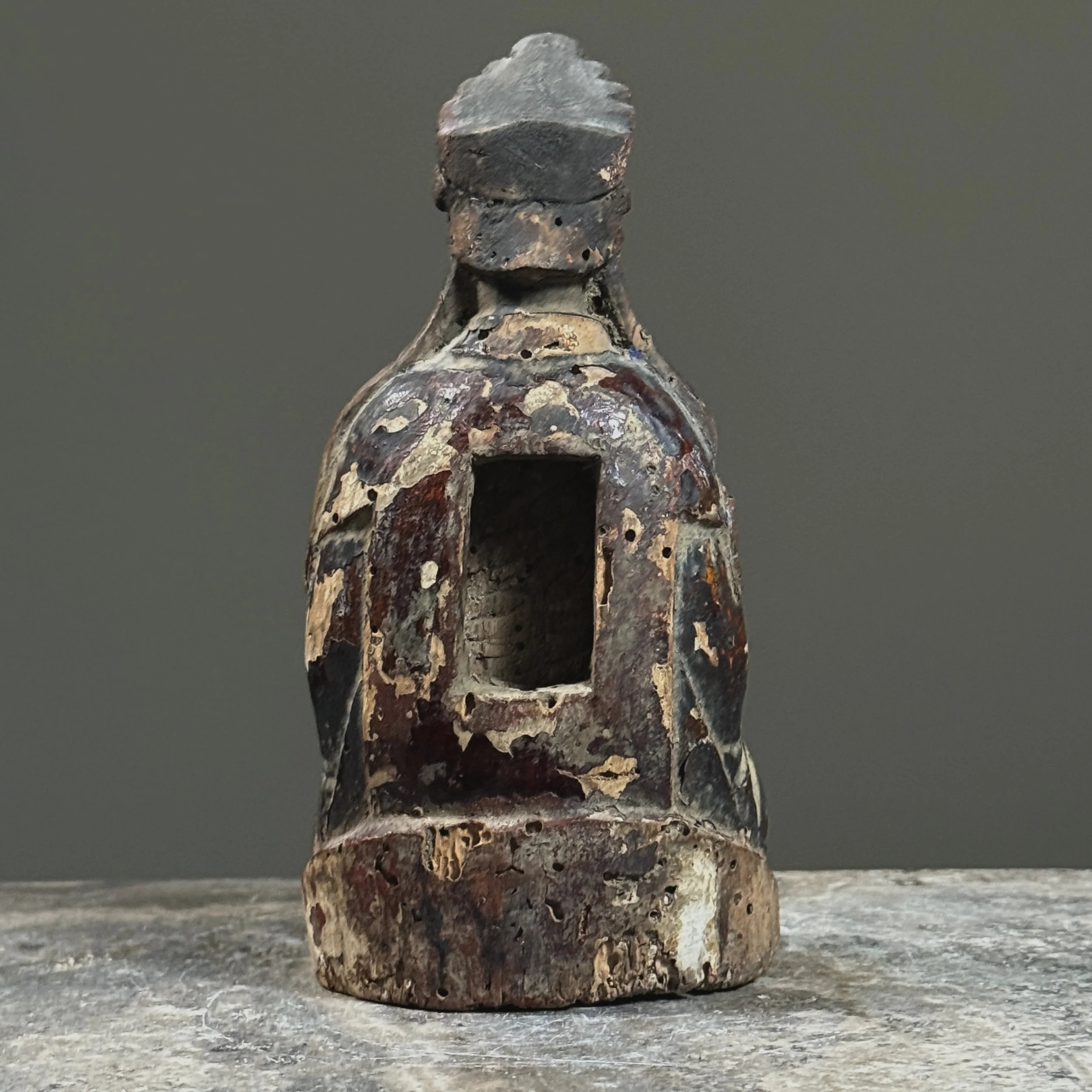 View of the reverse showing the rectangular prayer slot cavity.