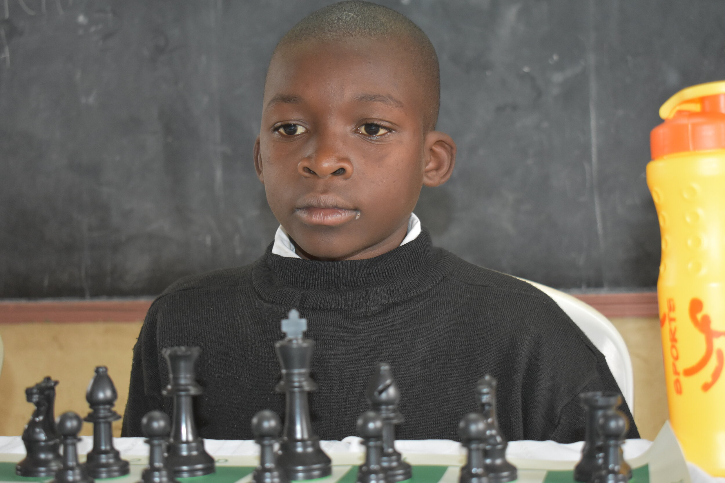 Isaiah Otieno EmpowerME Child and Chess Player.JPG
