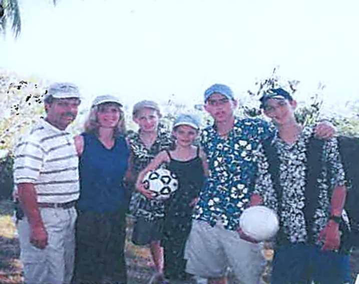 A younger Tim and Barb with their 4 children (1).png