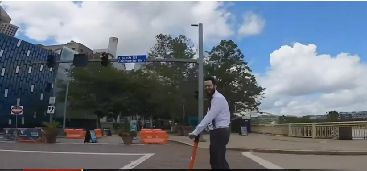 Scootin' in a Suit on a Bridge WXPI.png