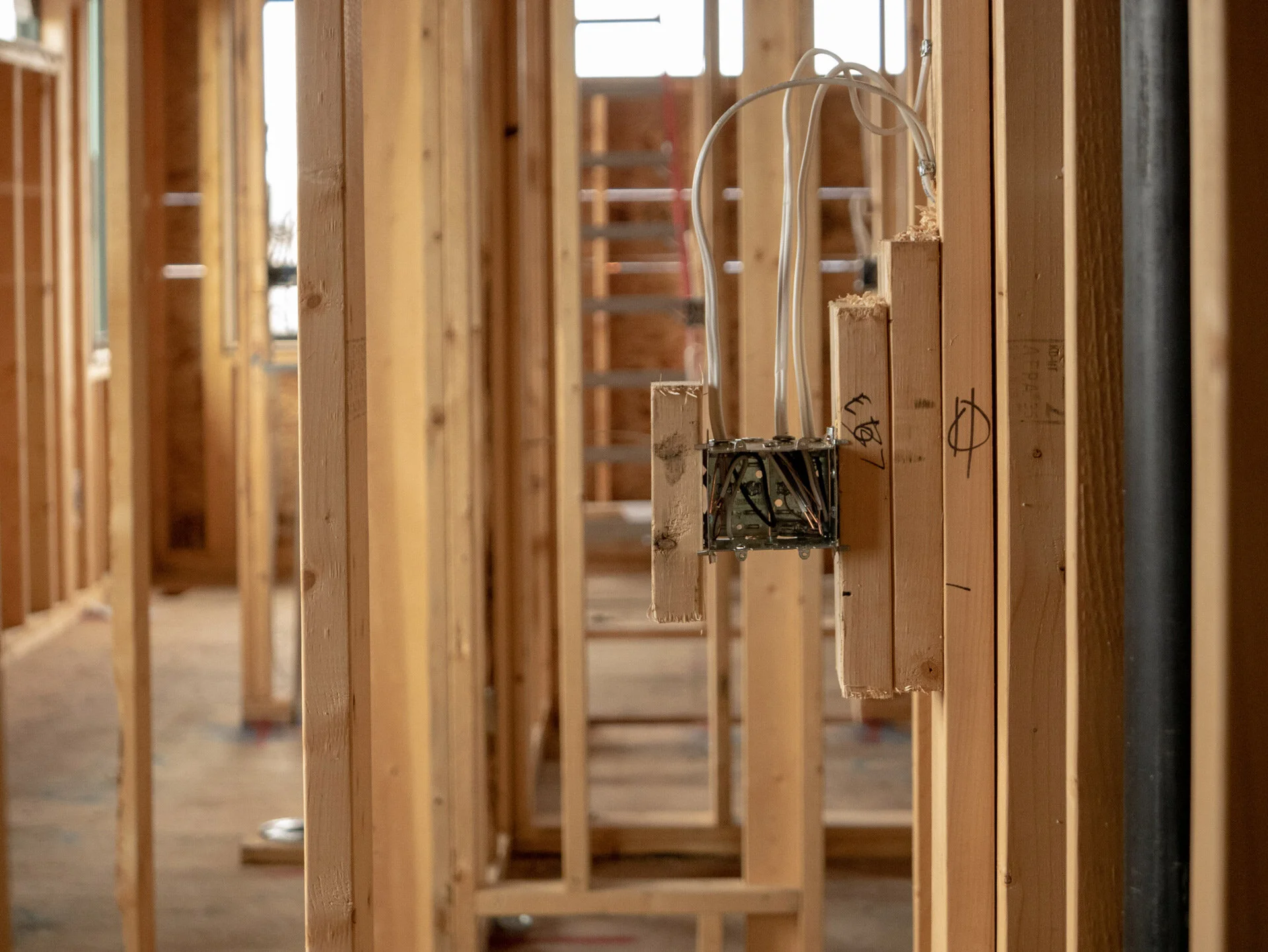 Additional board bolsters this switchbox. This isn’t the typical adjustment done by many electrical contractors. We do it because it’s quality and it helps it to stand up to wear-and-tear, during drywall and after.