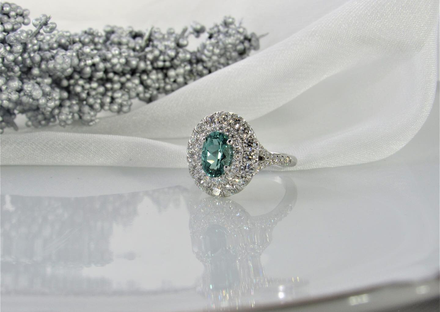 Steal the show at your holiday parties this year with our stunning mint tourmaline and diamond double halo ring ! @coastdiamondjewelry  #thejewelersbenchhershey #hershey #diamond #diamondring #mint #minttourmaline #tourmaline #ringsofinstagram #ring 