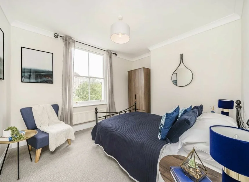 staged bedroom, in period conversion islington