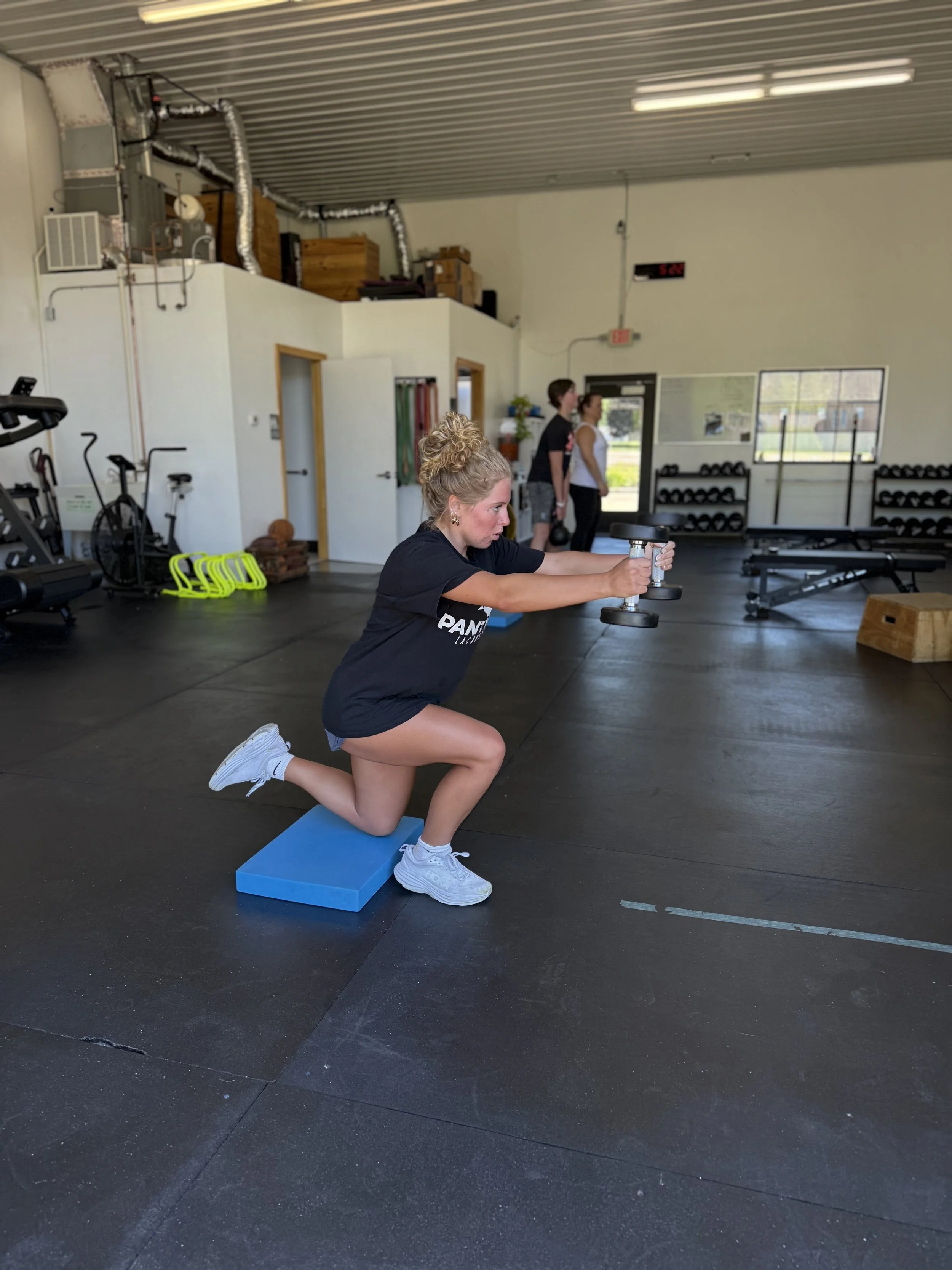 high school athlete doing single-leg strength training at pick health & performance