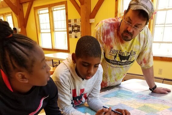 Kids learning at the farm