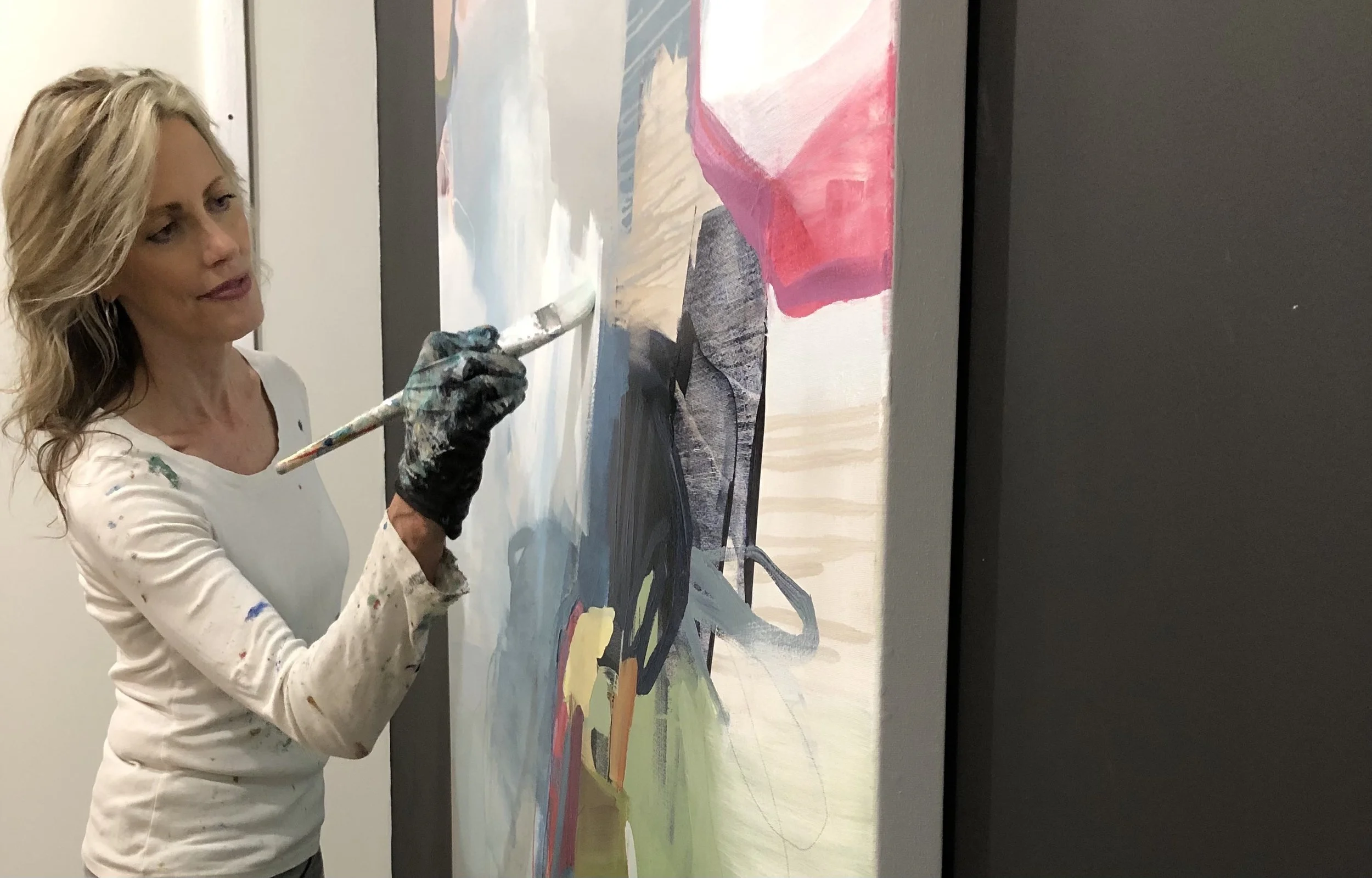 Cat Tesla working on a 60x60 non-objective abstract painting.jpg