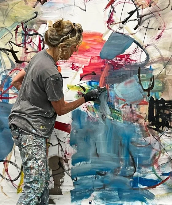 Cat Tesla  working on a 60x72 nature-inspired abstract painting (2).jpg