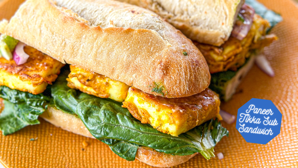 Isolated close-up of a sub sandwich with paneer, lettuce and