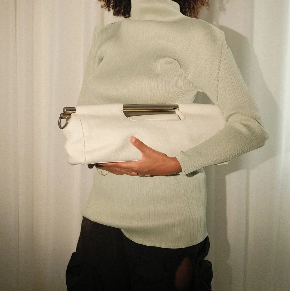 prada vitello daino metal bar top handle clutch - cream (2003