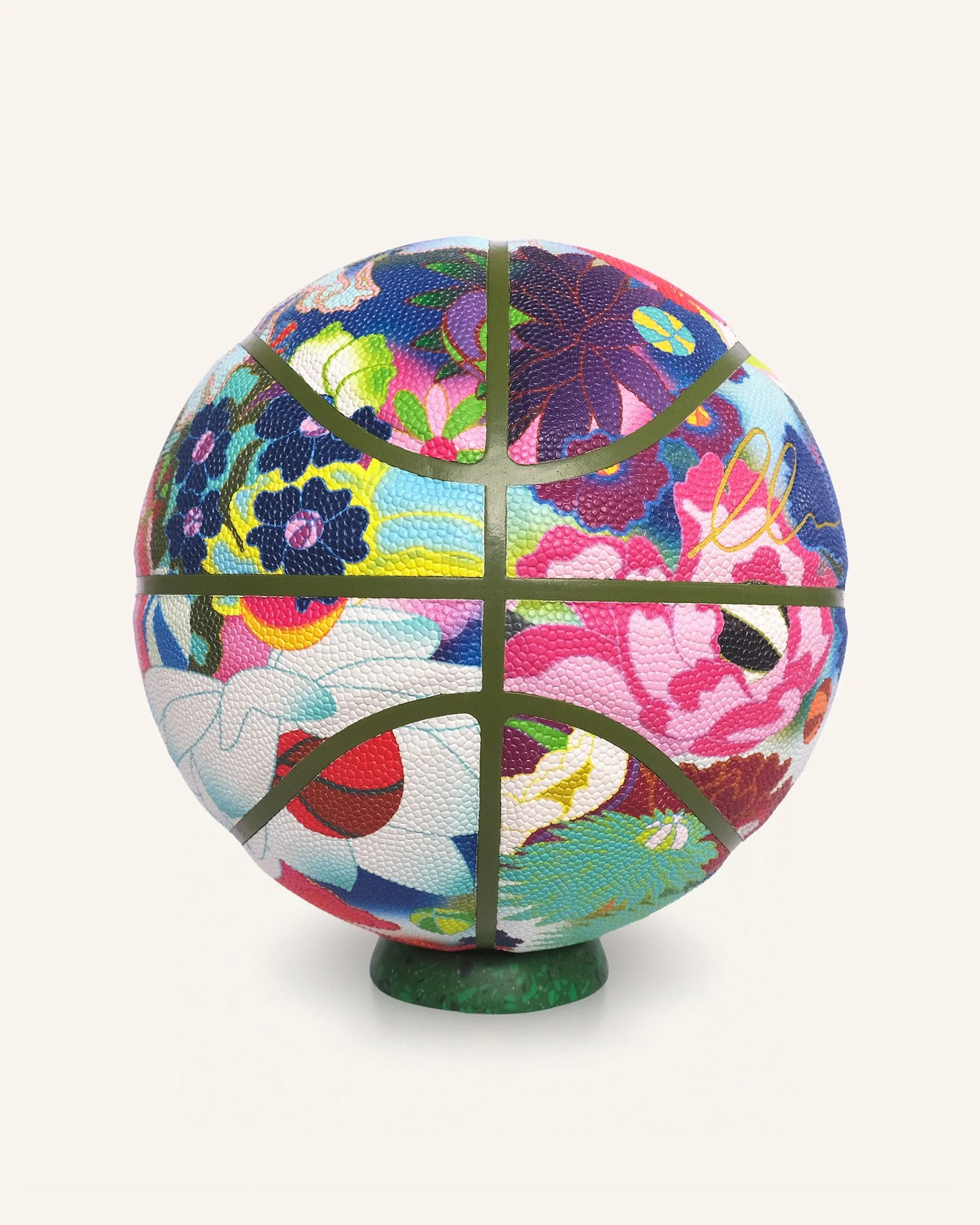 Floral designer basketball showing cross-panel layout, Edo Ball art basketball with Japanese blossom pattern and multicolour graphic design.