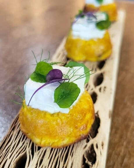 Cachapas are traditional Venezuelan golden fried corn cakes made from fresh corn and folded over with cheese.⠀
⠀
This is our chef's gourmet take on them! Cachapa, feta cheese, and dill aioli