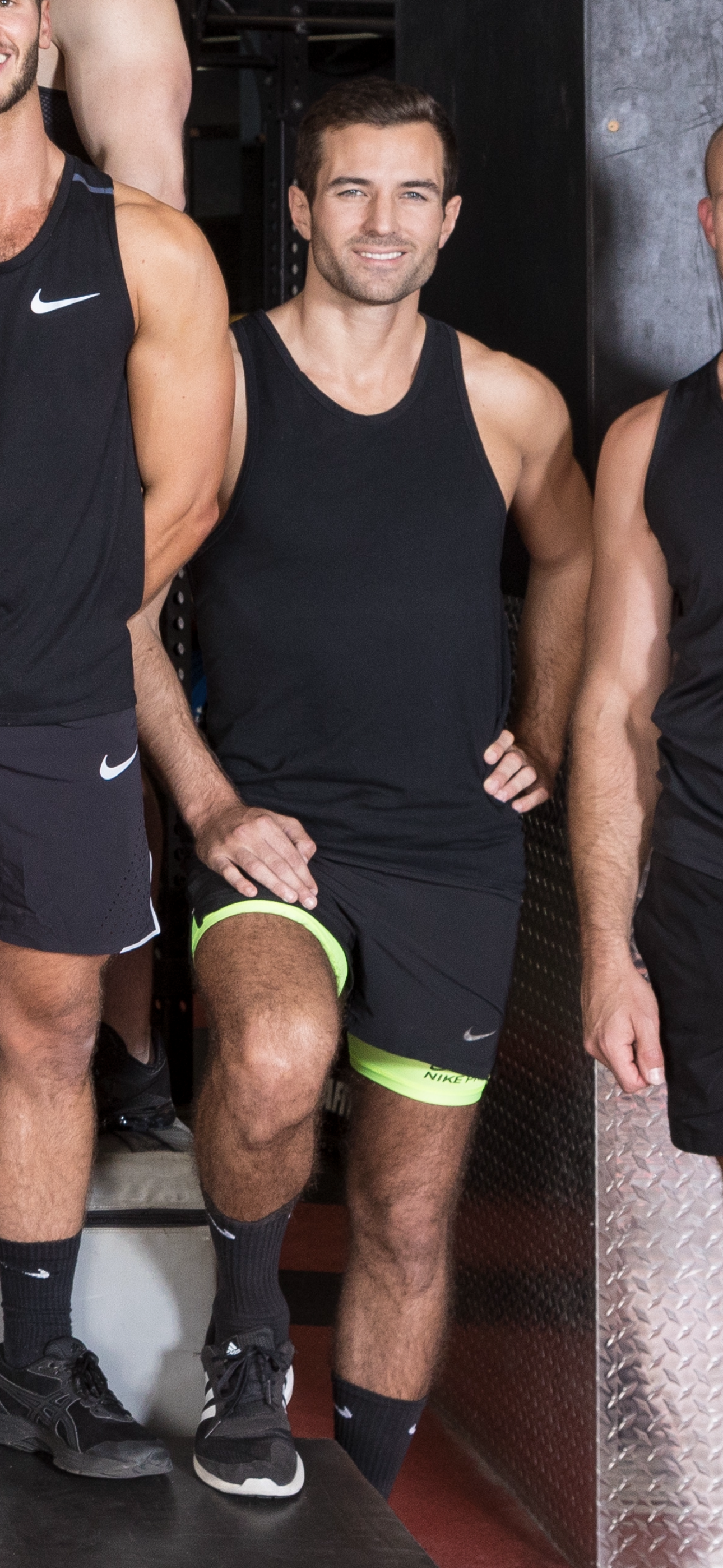 Miguel posing, showing his muscle gain after FullForm coaching in Sydney