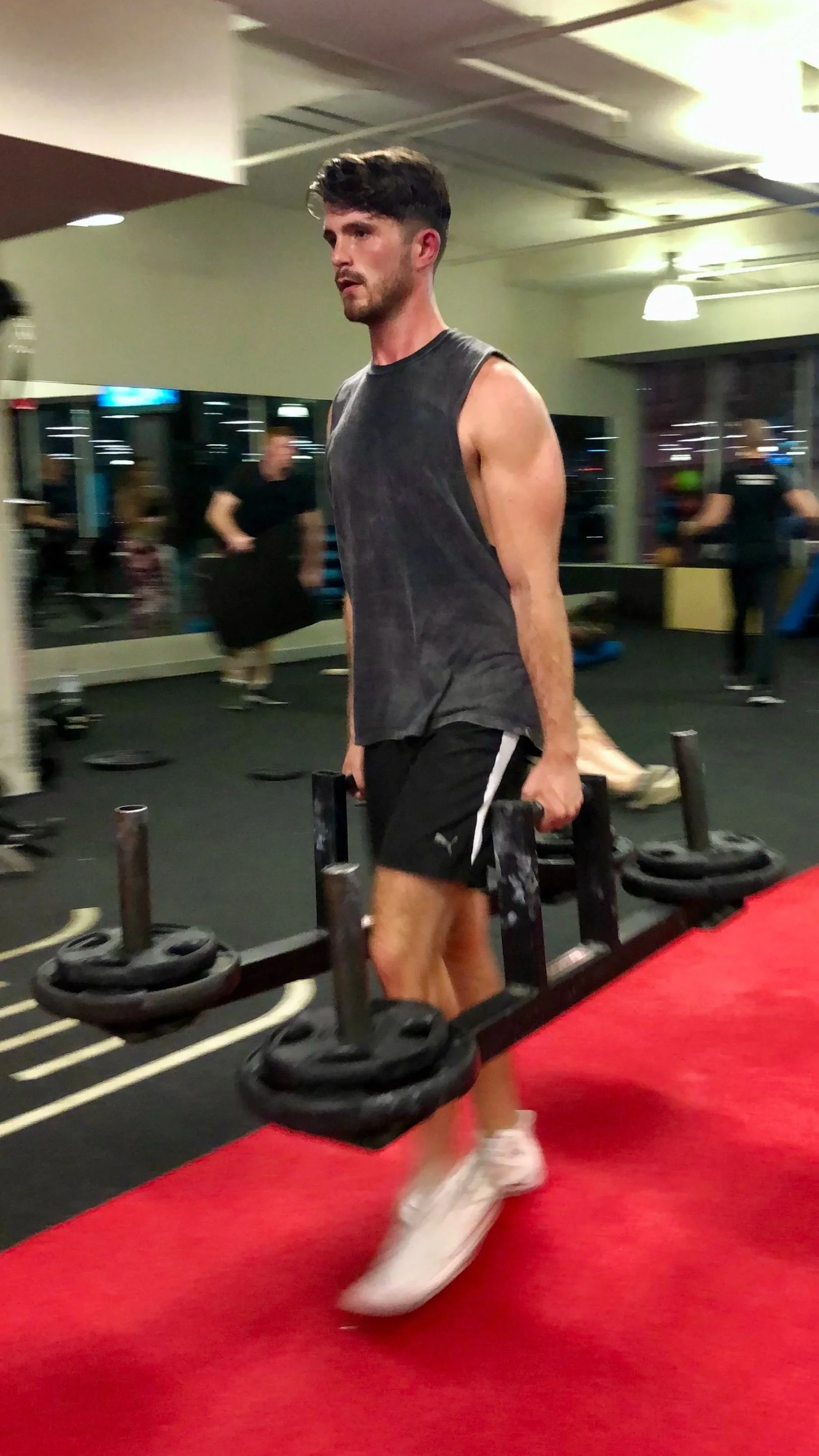 Willem doing farmer's carries during a FullForm training session in Sydney