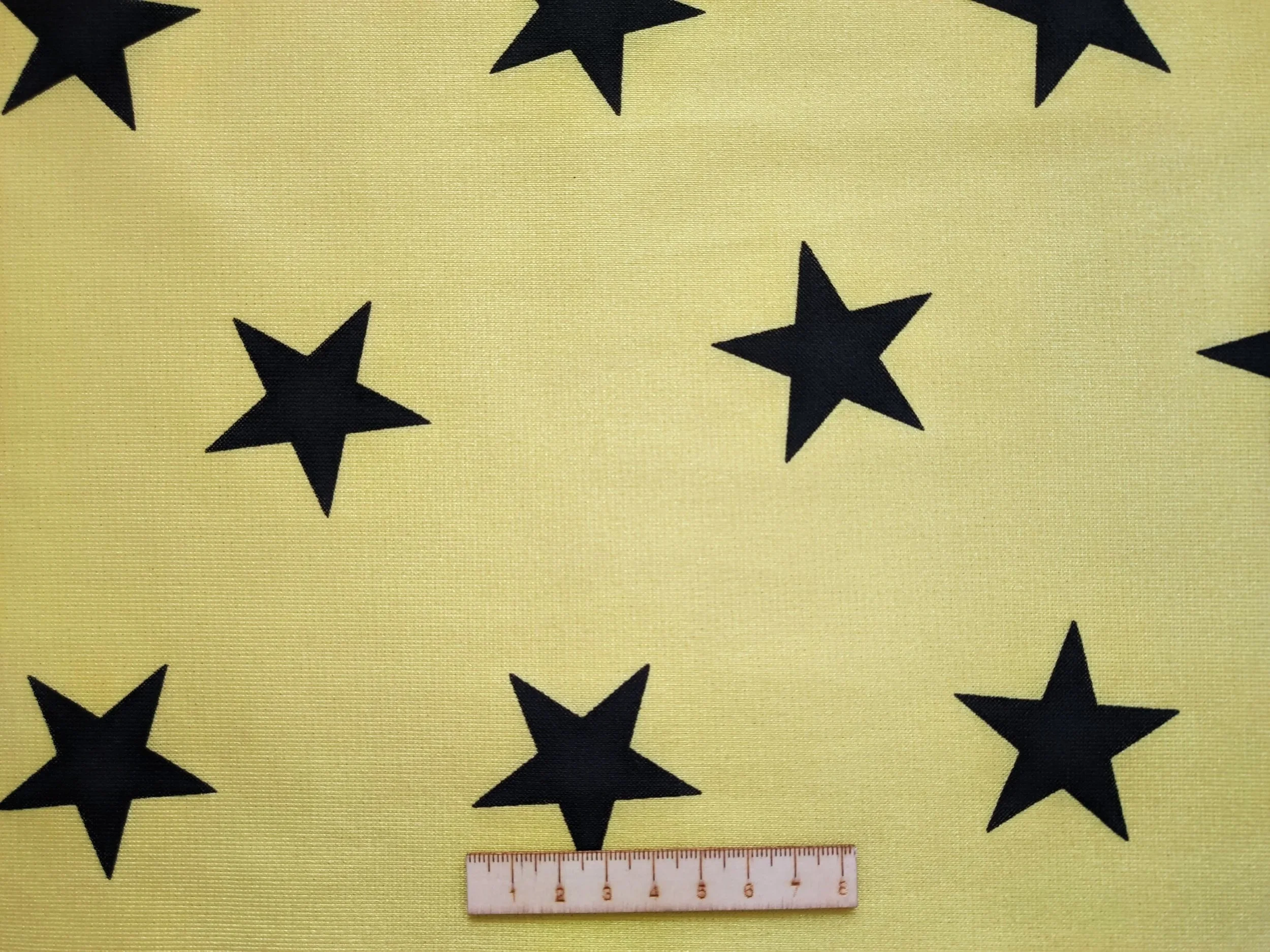 ESTRELLA NEGRA CON FONDO AMARILLO