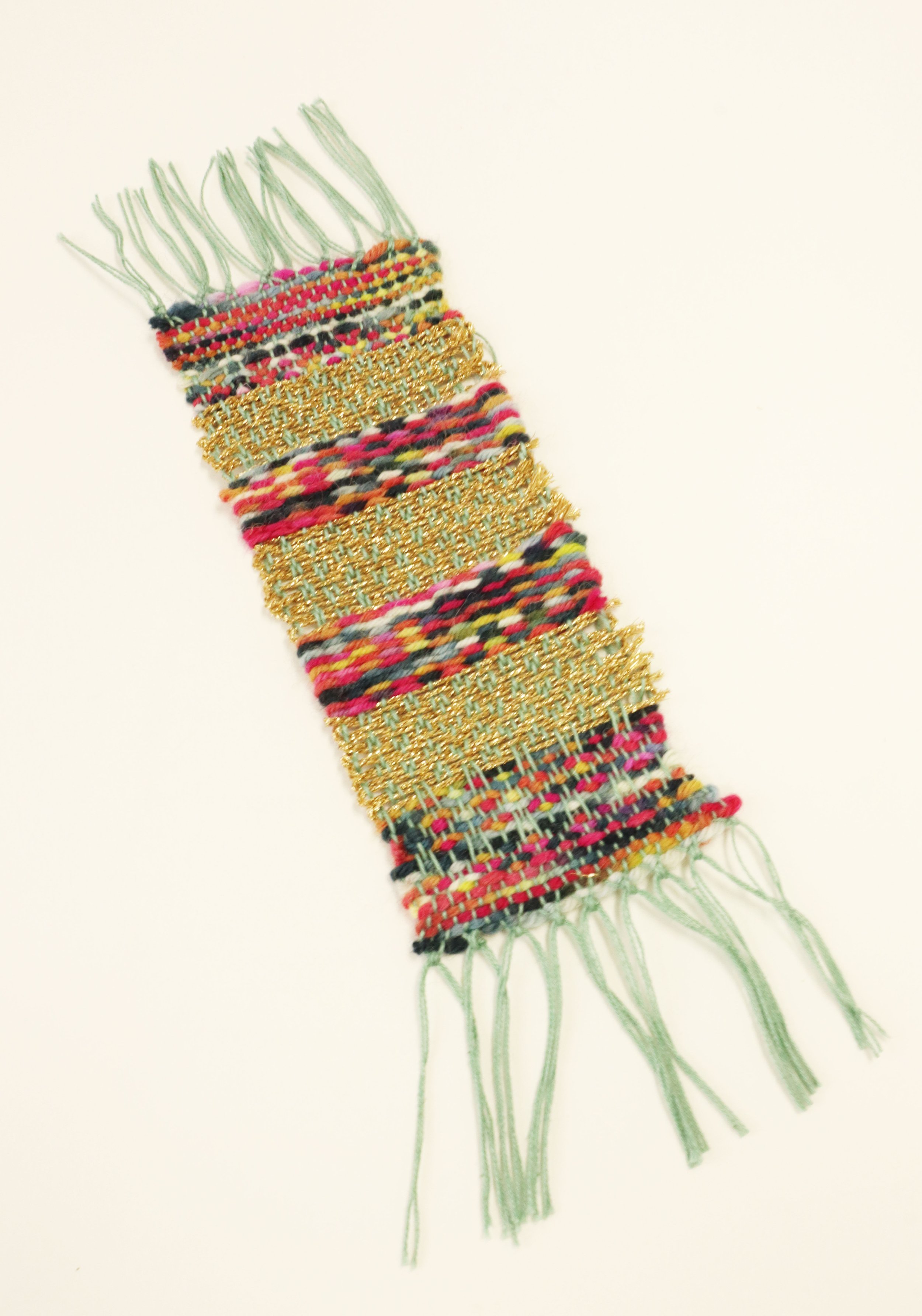 Gold and multicoloured yarn woven bookmark