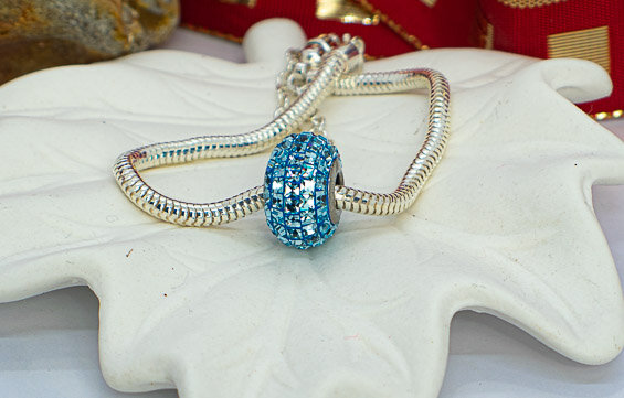 Sterling silver snake bracelet with Swarovski bead and safety chain