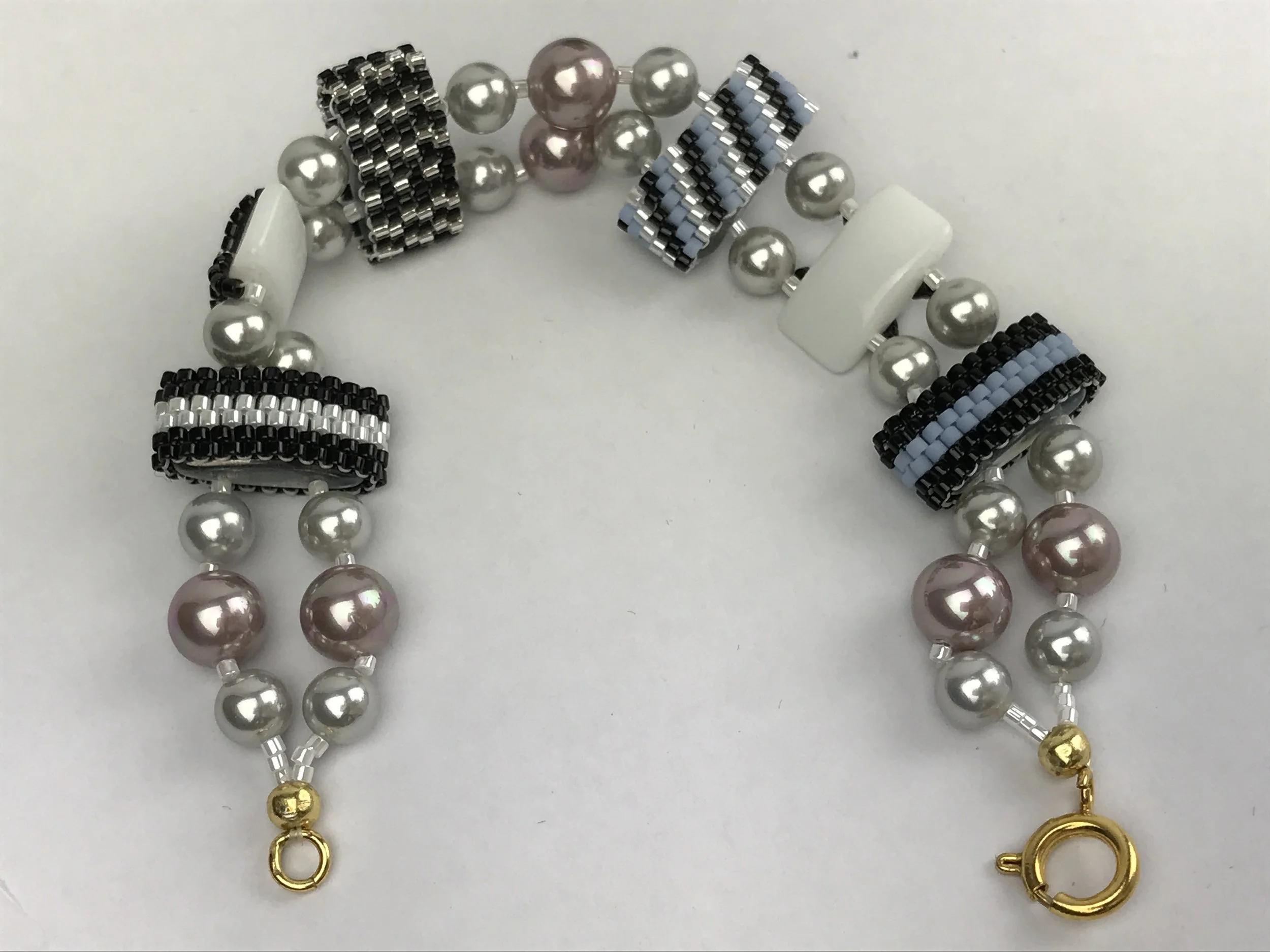 Blue and black carrier bead bracelet2.jpeg