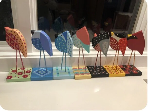 Birds lined up in the window...waiting for snow?!?