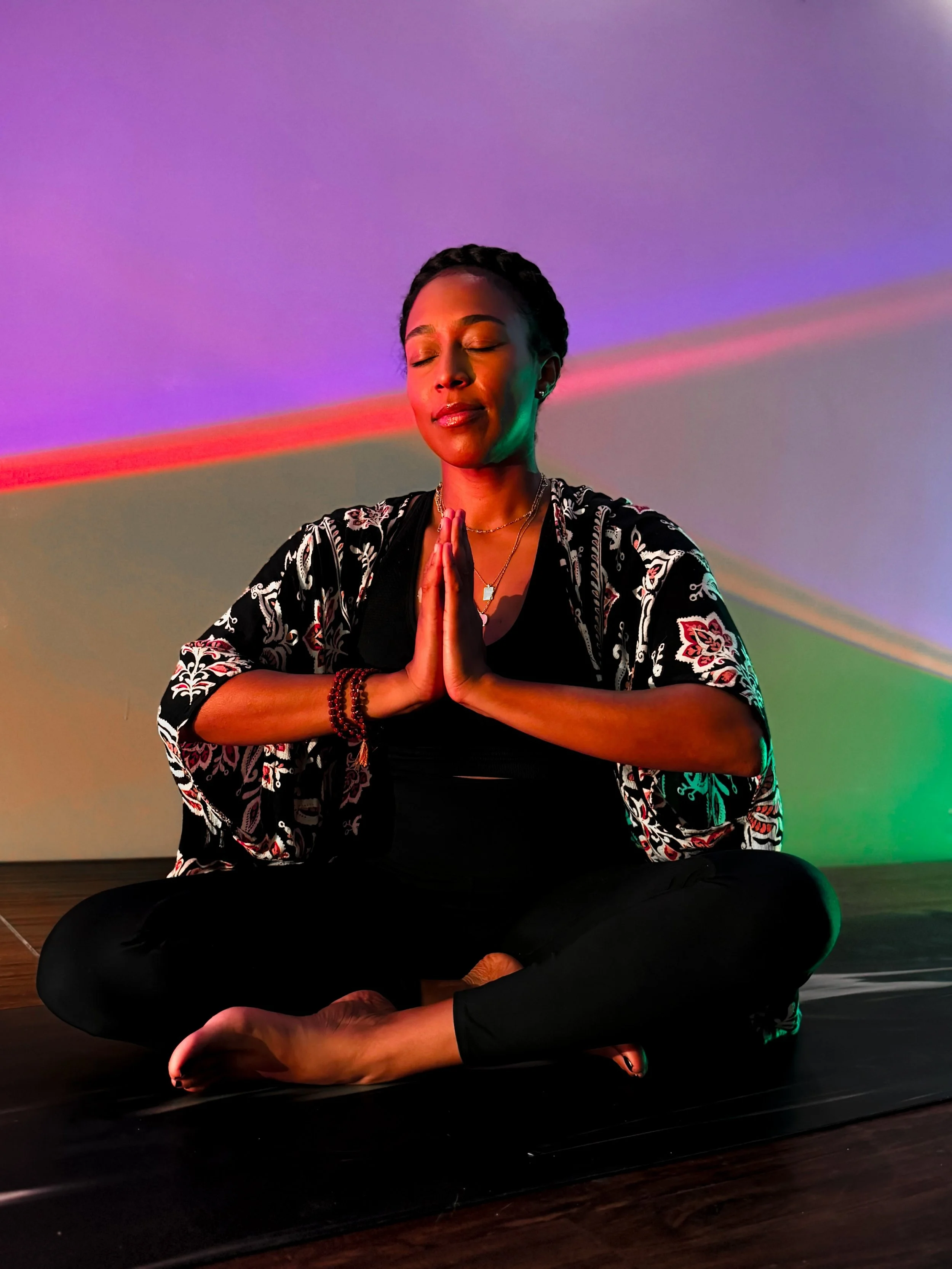 Kerrie Trahan first explored yoga in 2005 and deepened her practice after moving to Yeosu, South Korea. Through consistent practice, she found healing after the loss of her father and became inspired to share yoga with others. She trained in the U.S.