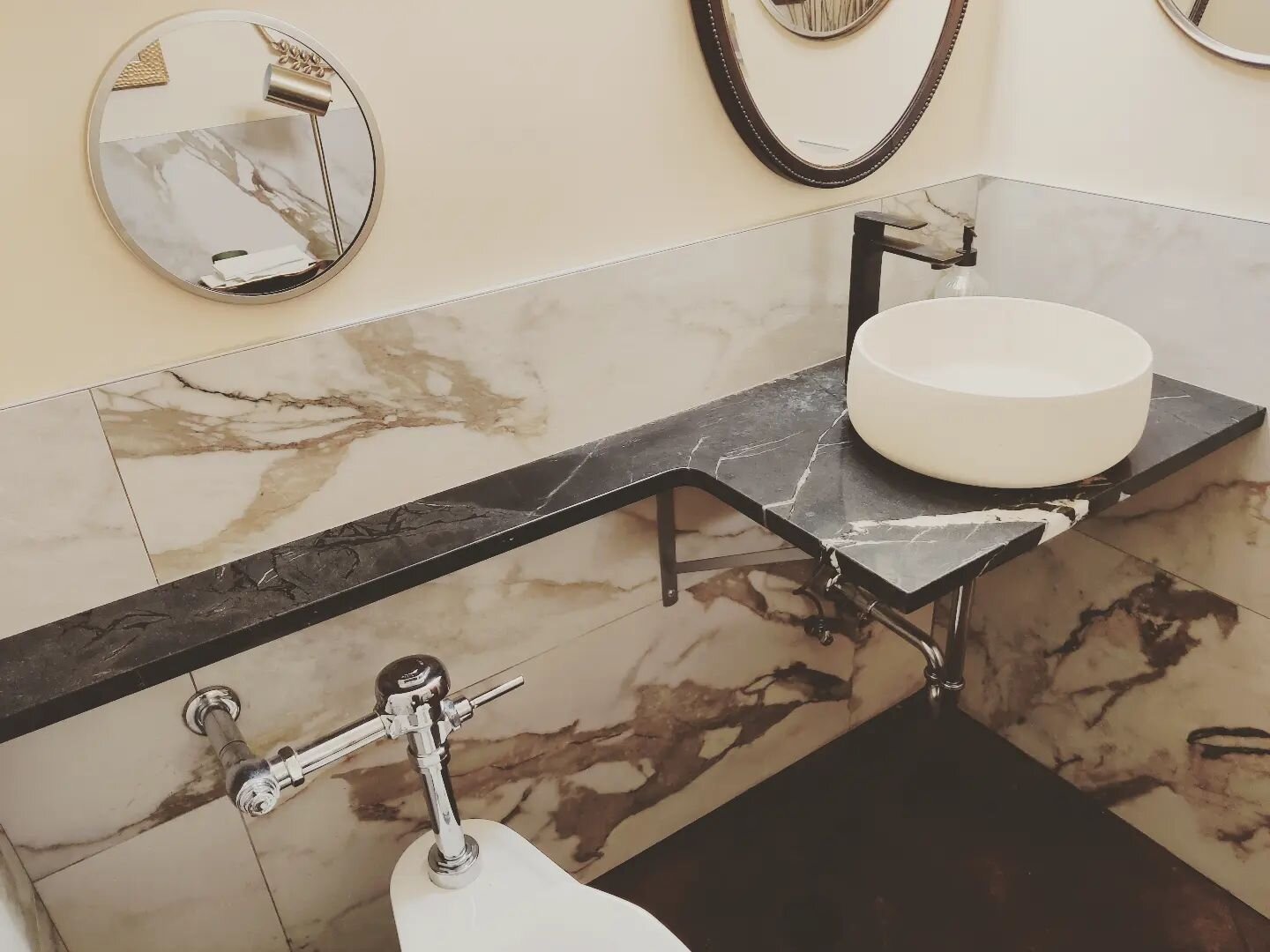 @bigatulsa has gotten an upgrade! Their bathroom countertops were made with remnant material called black diamond #naturalstone . The entrance was redone as well and is inviting and ready to serve. Thank you #midtowntulsa