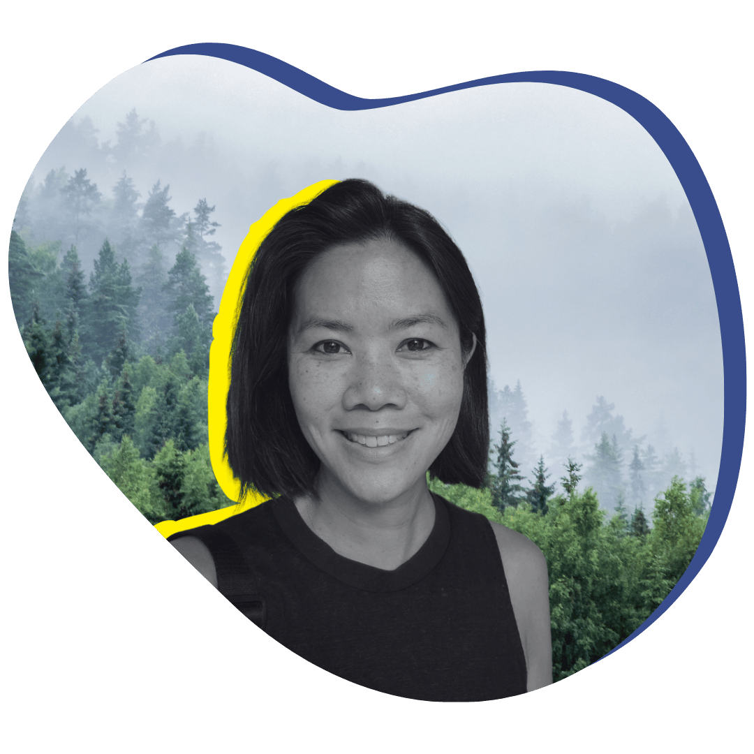 Black and white headshot of asian woman smiling.