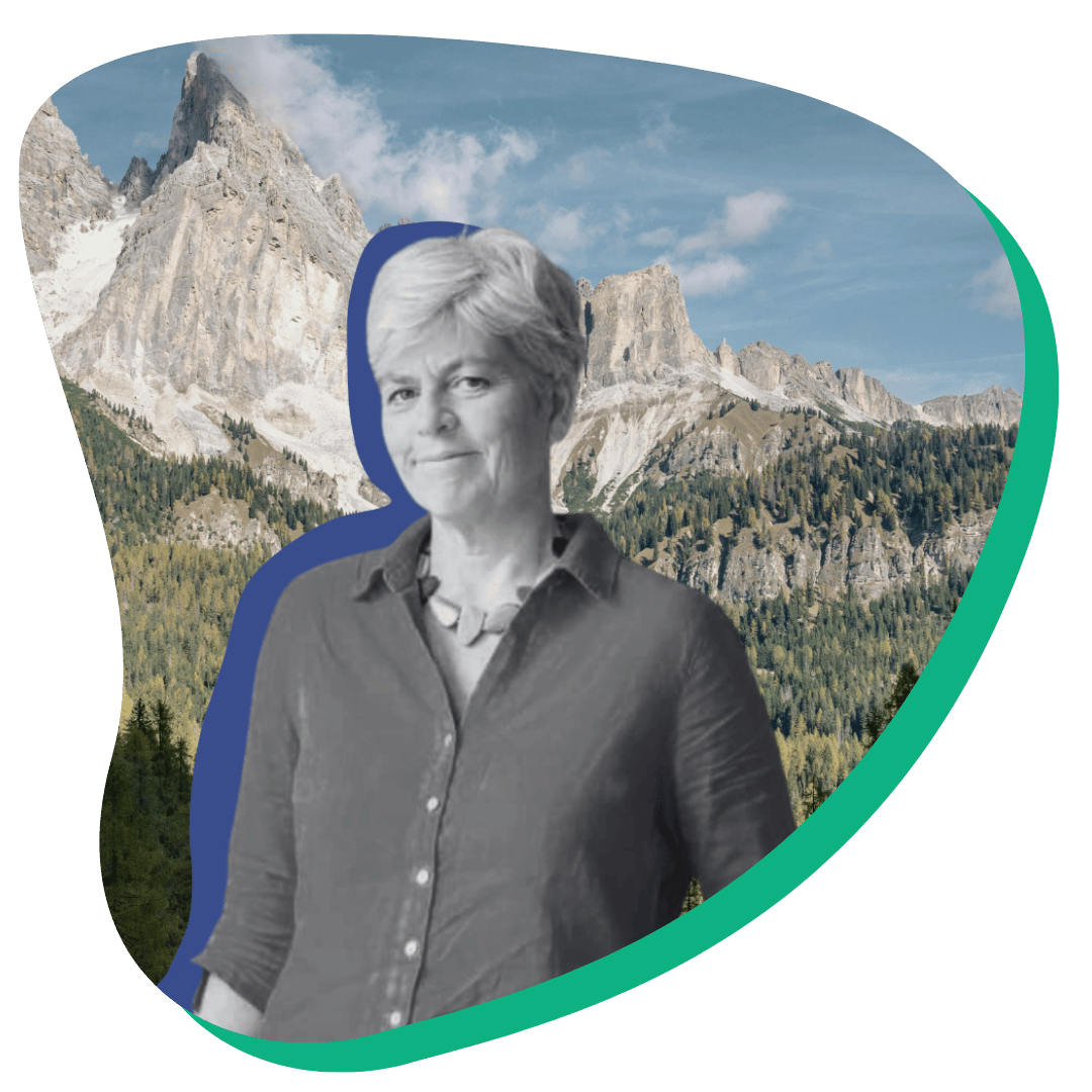 Black and white photo of a white woman smiling.