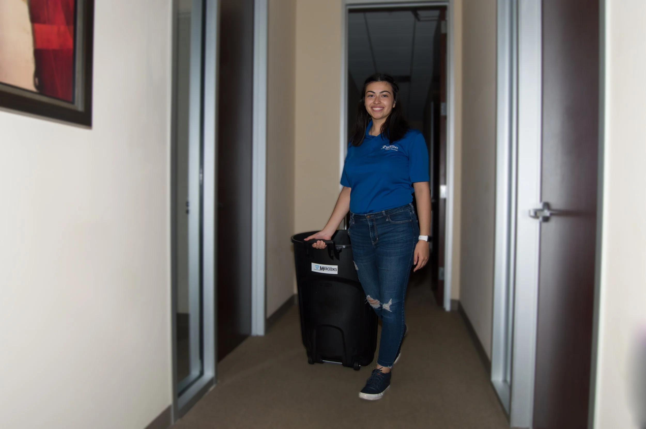 Sara with trashcan.jpg