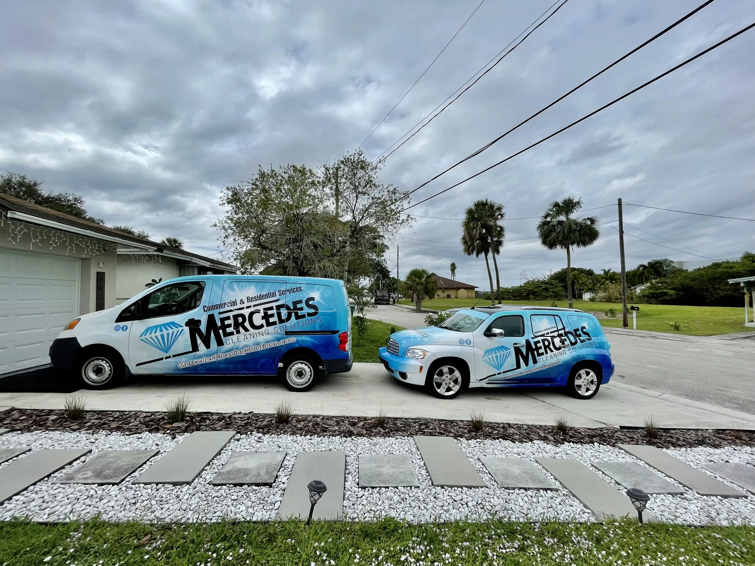 both vans in driveway.jpg