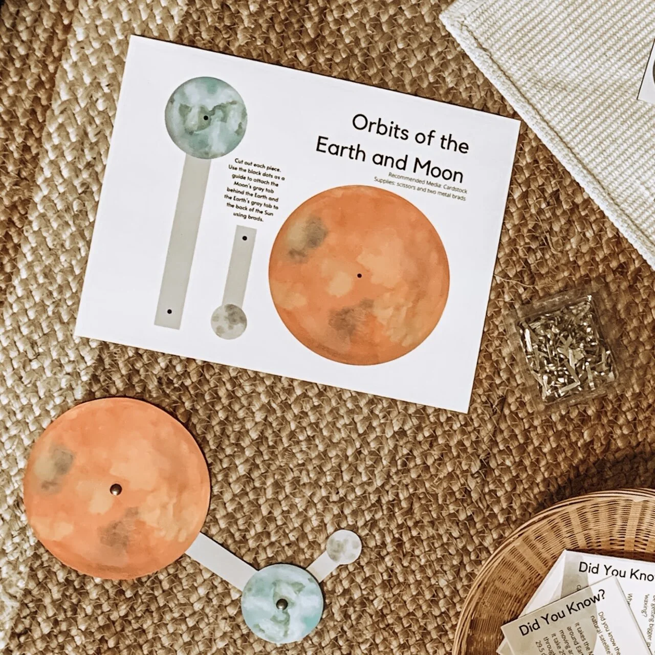 Hand-painted watercolor orbits of Earth and Moon STEM project printable for kids ages 2-6 by Liza Dora Books
