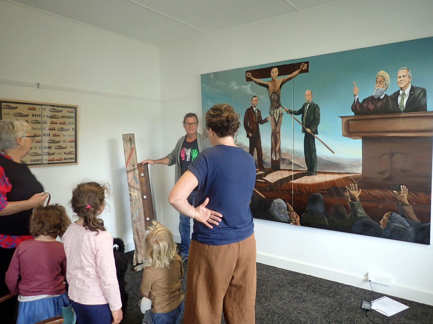  Andrew Blake discussing his sculpture , with Mostafa Faraji’s painitng  Martyr   and Basil Hall’s print 