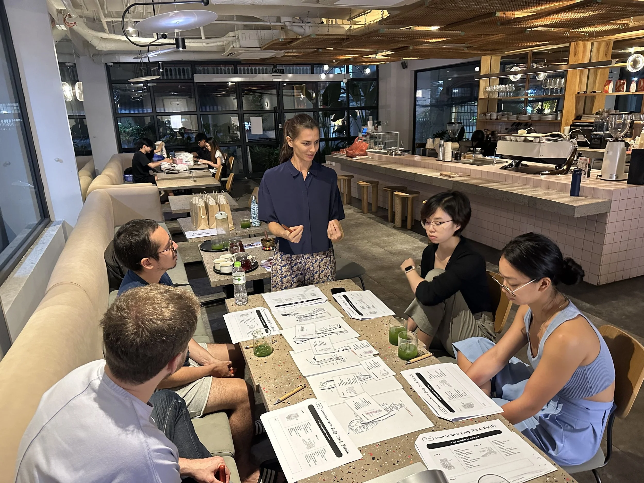 Ani Petrova leading a corporate wellbeing workshop in Ho Chi Minh City, Vietnam.