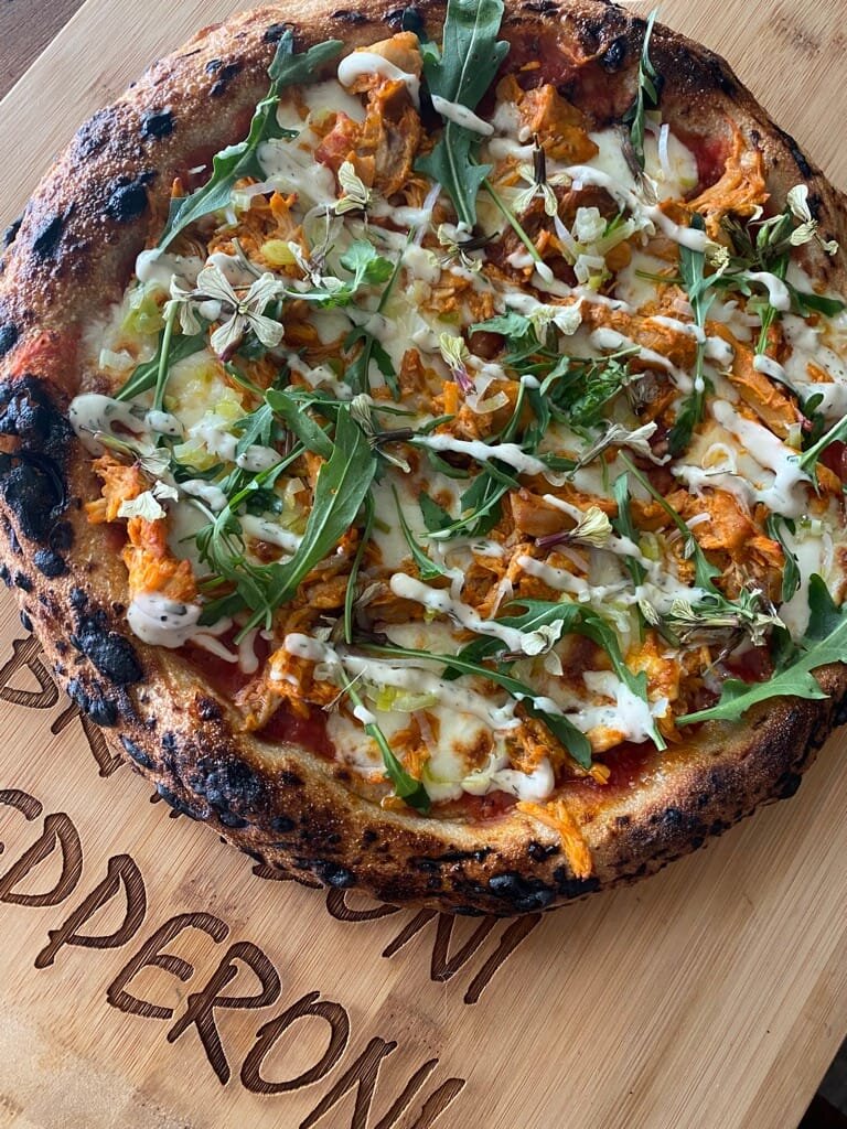 SO FLY - Buffalo Jidori Chicken, House Ranch, Steamed Milliken Farm Leaks, Mozzarella, Coleman Farms Petit Arugula & Flowers 