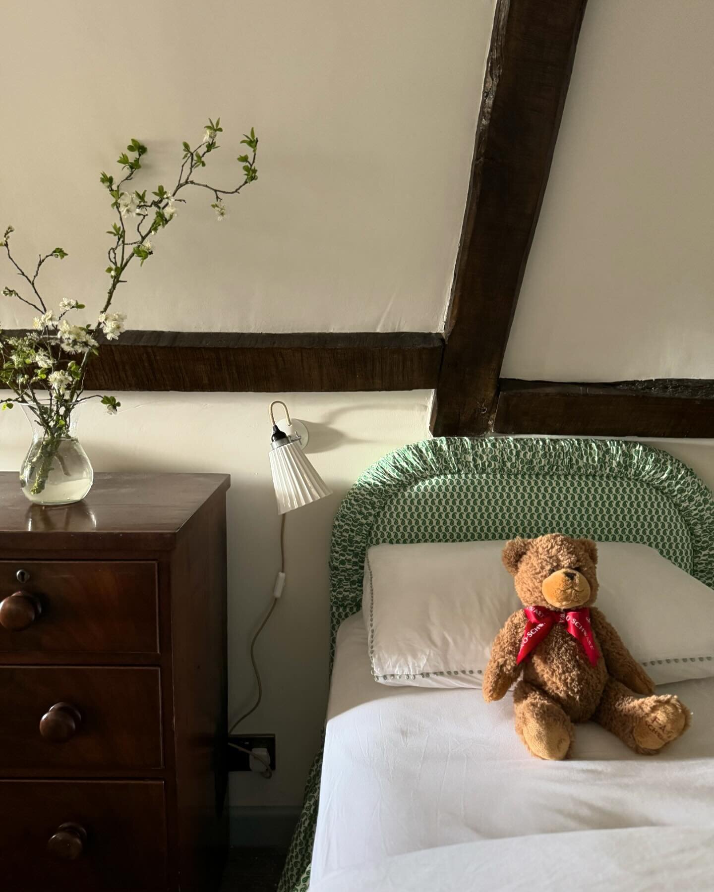 Attic bedroom for Teddy 💚 Prettiest ruched headboards and frilly bed valances in fine linen @howe36bournestreet in the eaves of a very old and beautifully atmospheric Norfolk house #charlottecroftsandco #interiors #countrylife