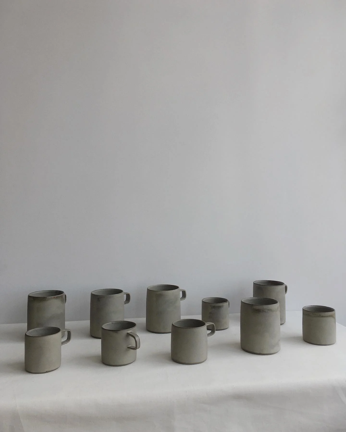Mugs and cups glazed with my &ldquo;slate&rdquo; glaze for a grey and rainy day. 
Have a nice weekend ☁️
.
#atelierepiney #cups #tasses #ceramics #ceramicsmonthly #ceramicart #ceramique #minimalpottery #minimal #pottery #potter #wheelthrown #tablewar