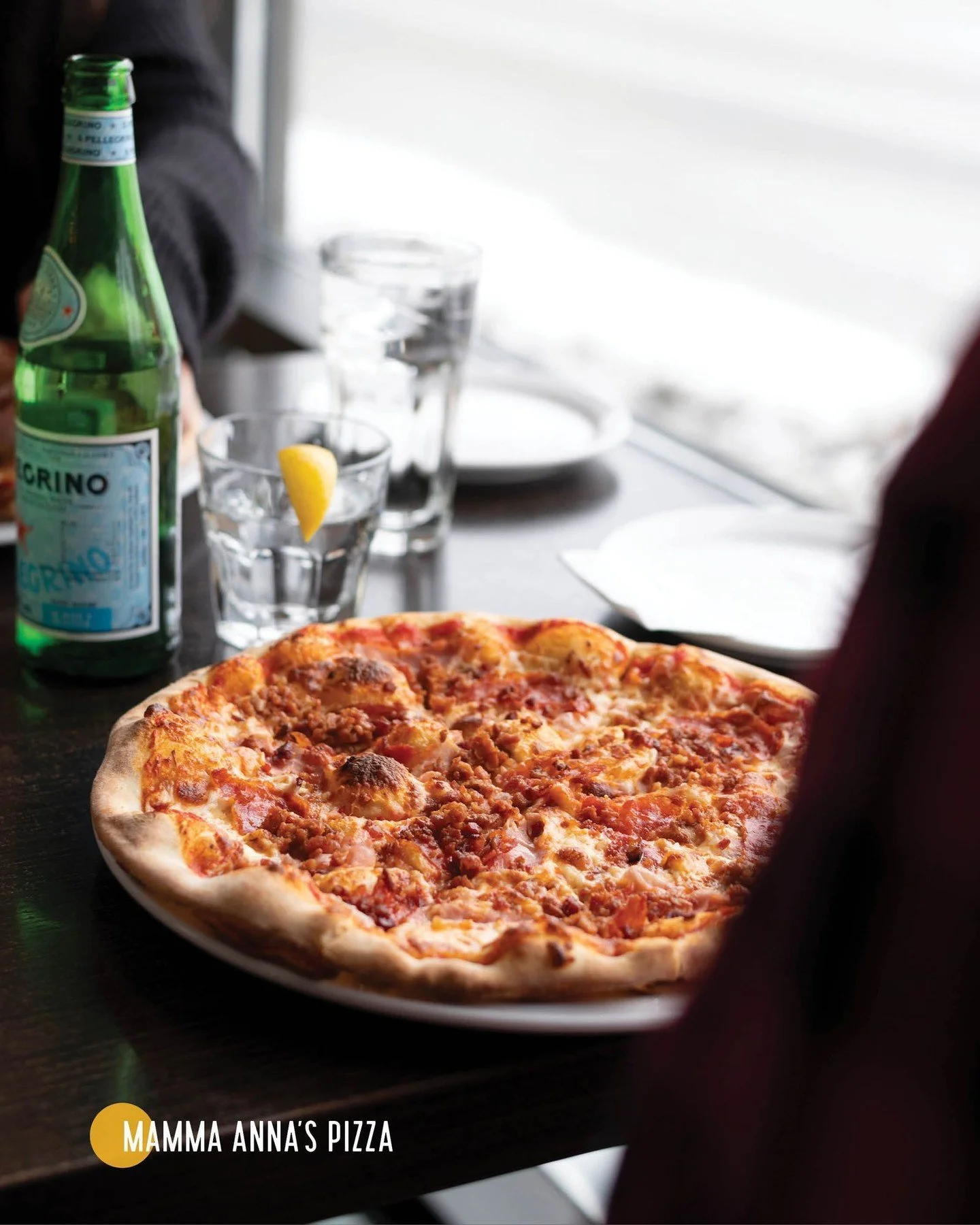 Nonna Annie makes our signature Mamma Anna’s Pizza with our delicious house-made tomato sauce, melty mozzarella cheese, spicy Italian sausage, rich salami, tender ham and crispy bacon on a perfectly authentic thin crust. Each bite carries the t