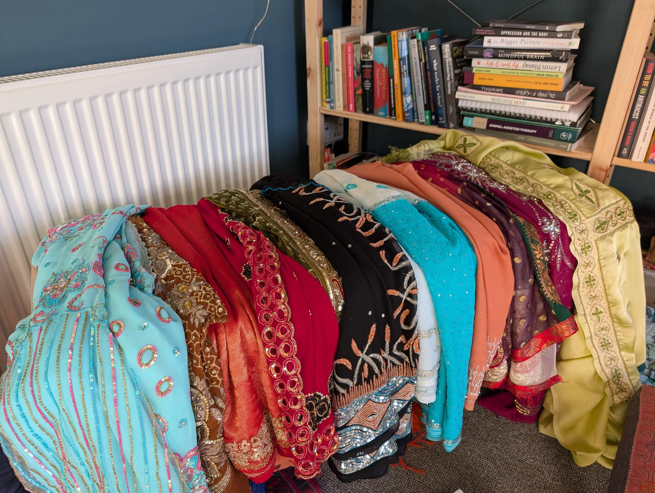 A table full of sarees