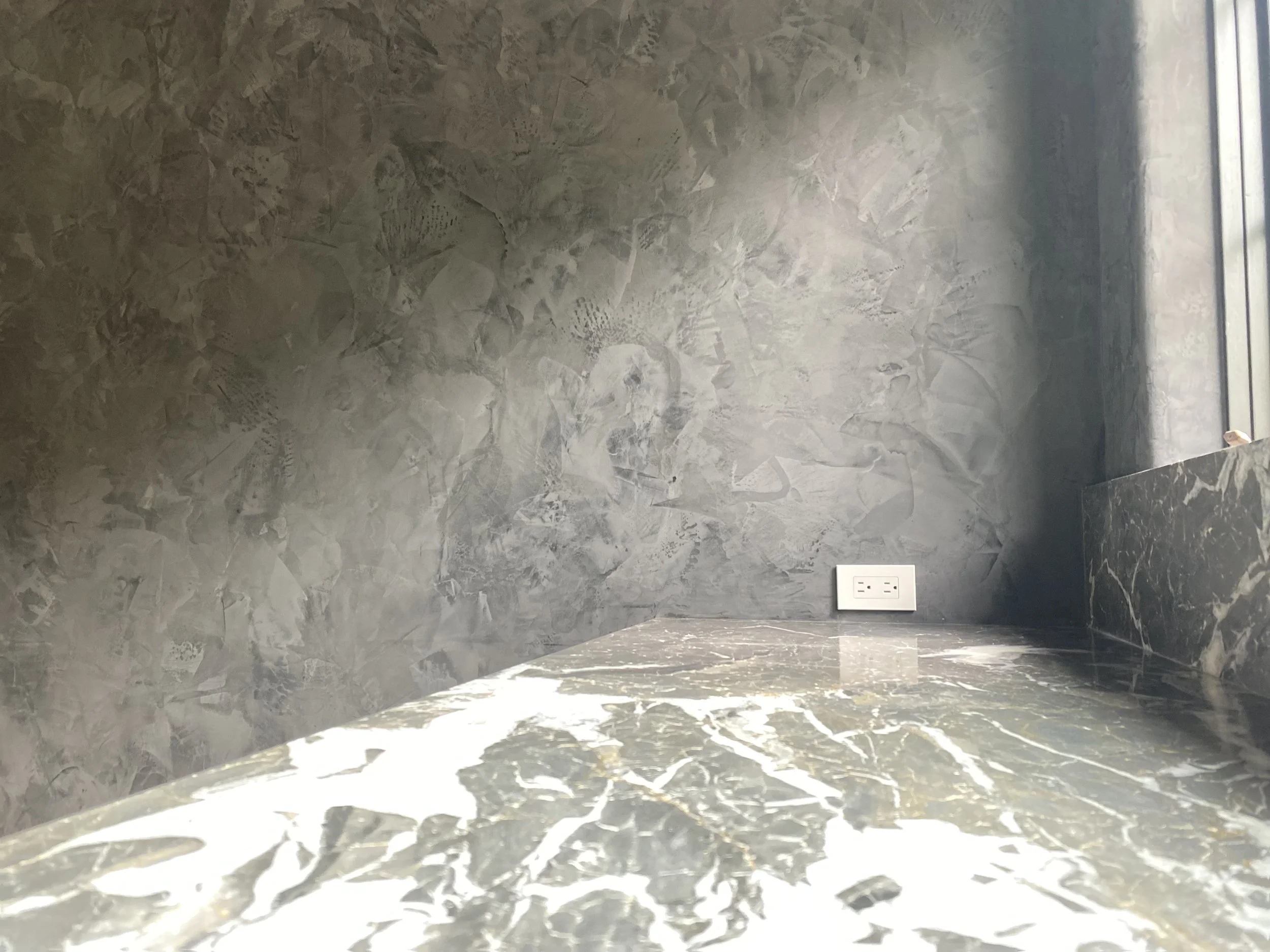 Venetian Plaster Fireplace with Bronze-Tinted Depth