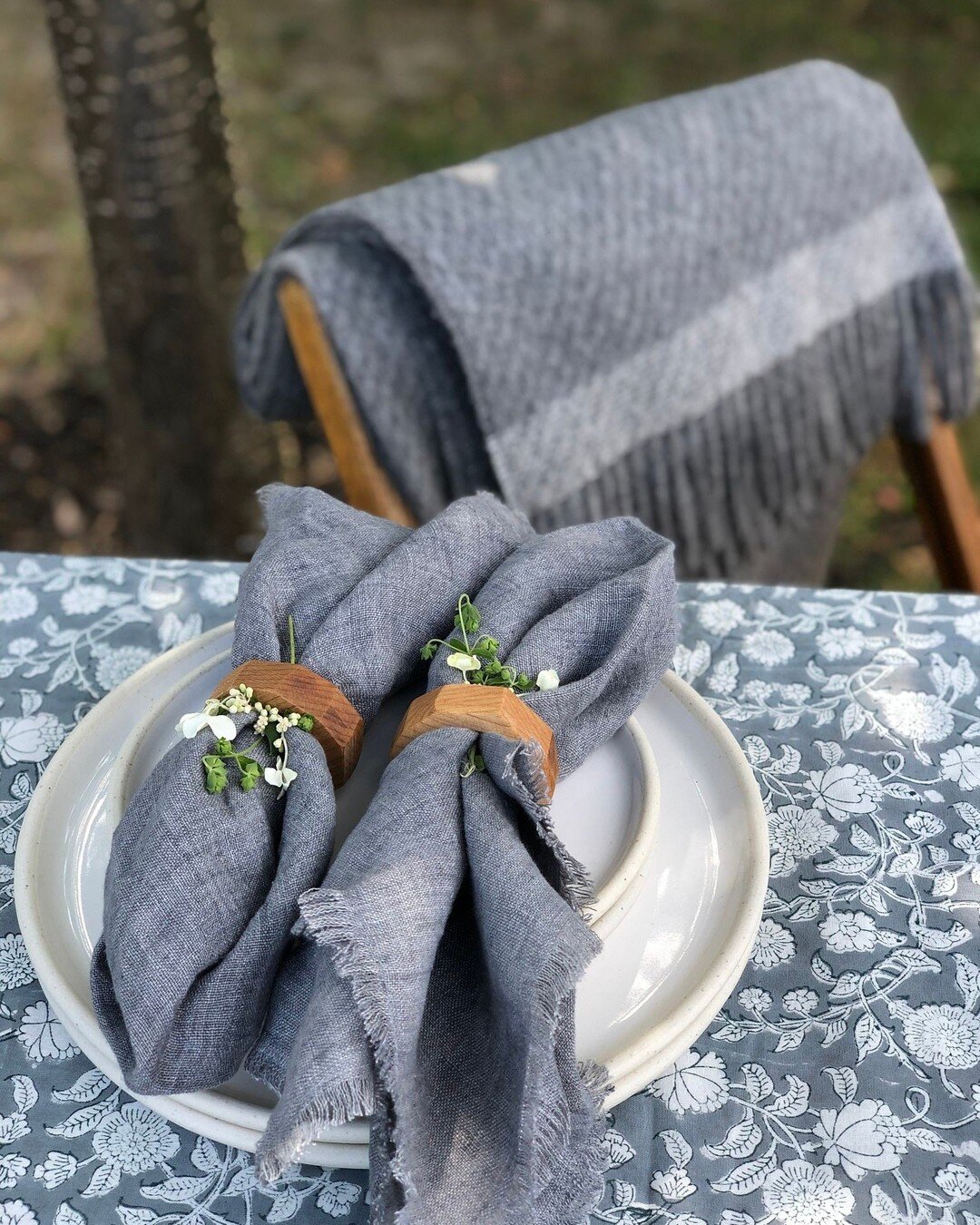 The best of both worlds! The weather is still inviting enough to dine outdoors yet the little chill in the air means we get to wrap ourselves in a wonderfully soft, cozy and oh so chic blanket that we just threw over the back of the chair because we 