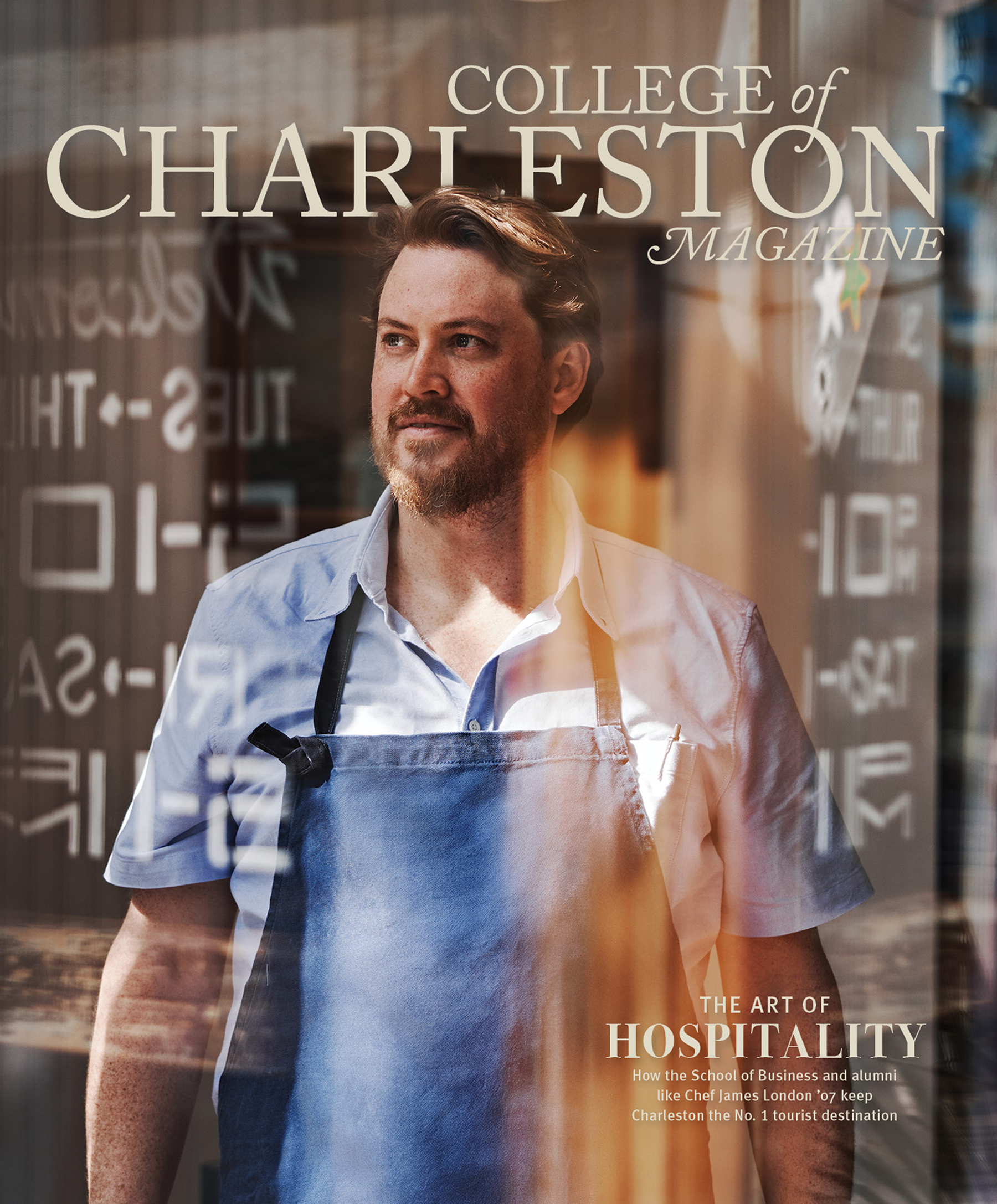 Magazine cover titled 'The Art of Hospitality' featuring a man in a light blue shirt and apron, standing in front of a wooden background with shelves.