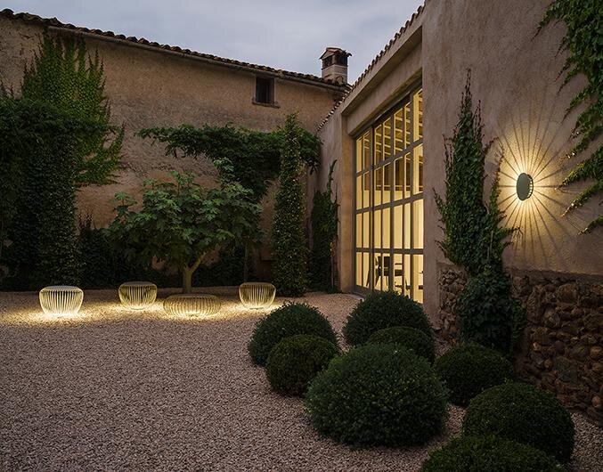 ^ Vibia Meridano - versatile outdoor series for seating, table, and sconce.
