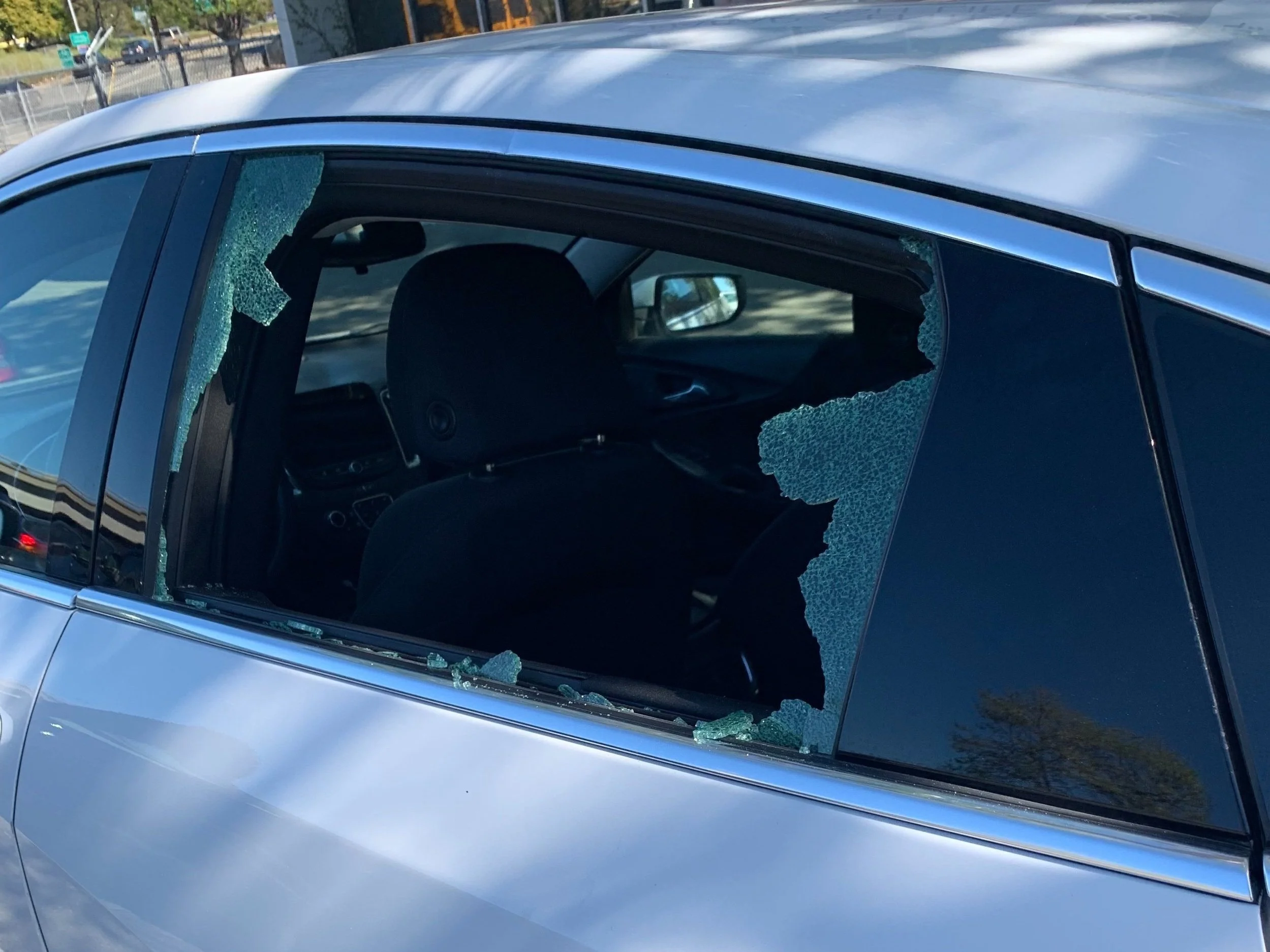 The production crew's car after a break-in during filming in the Oakland, one of the occupational hazards of documentary production on location.