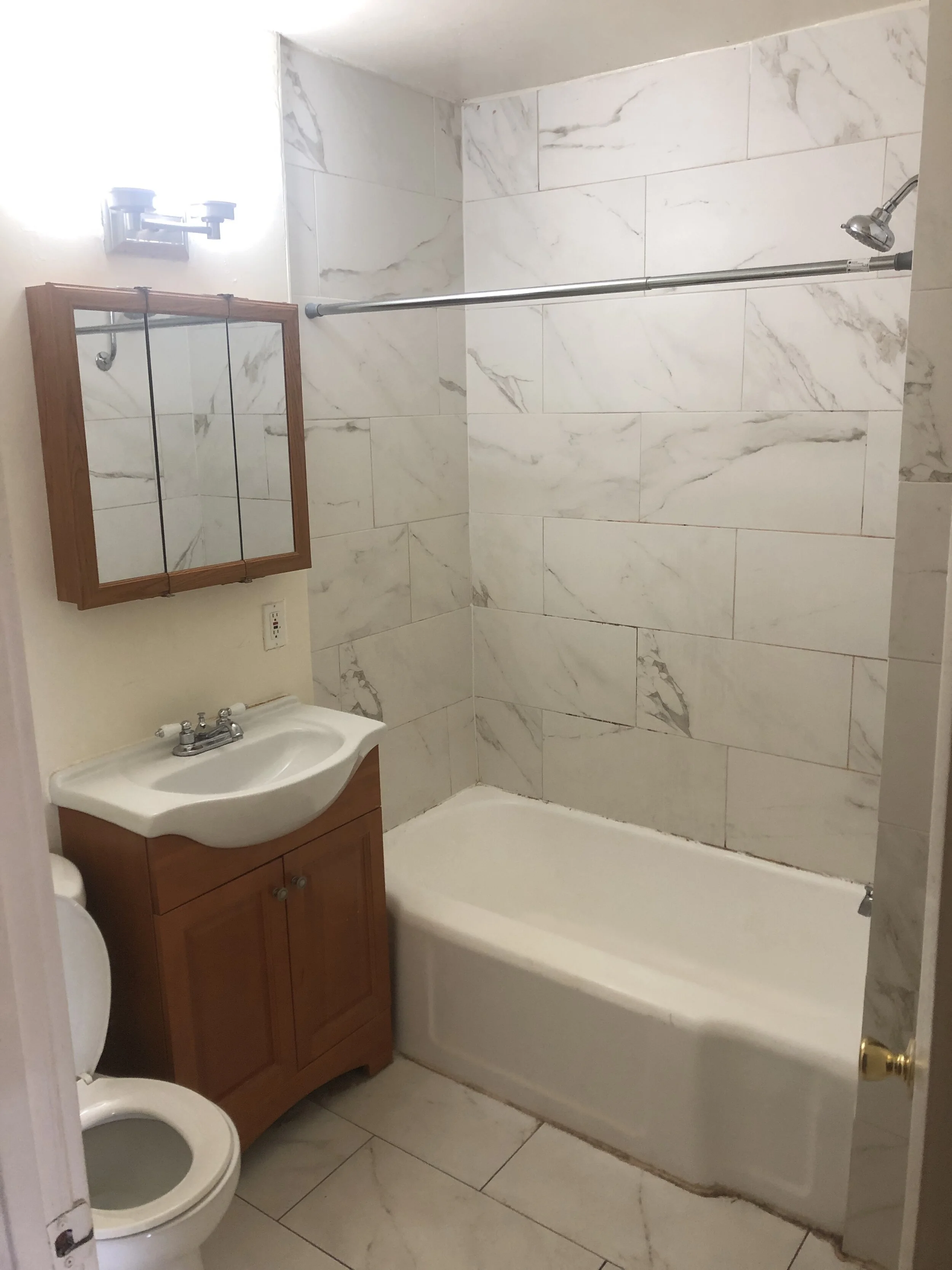New Marble Bathroom in Select Units