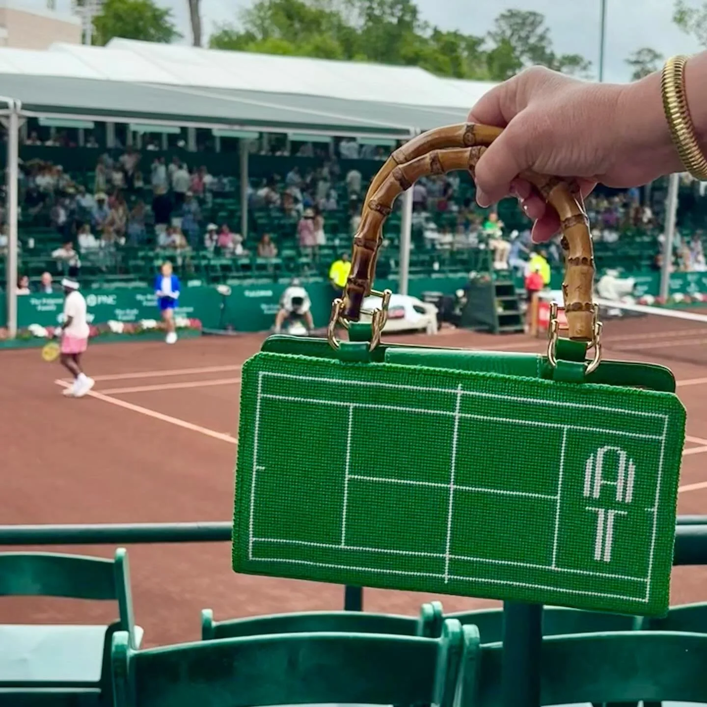 Putting &ldquo;the&rdquo; tennis purse through its paces this week at @mensclaycourt! (canvas by @francesabelstudio finishing via @stlneedlepoint)