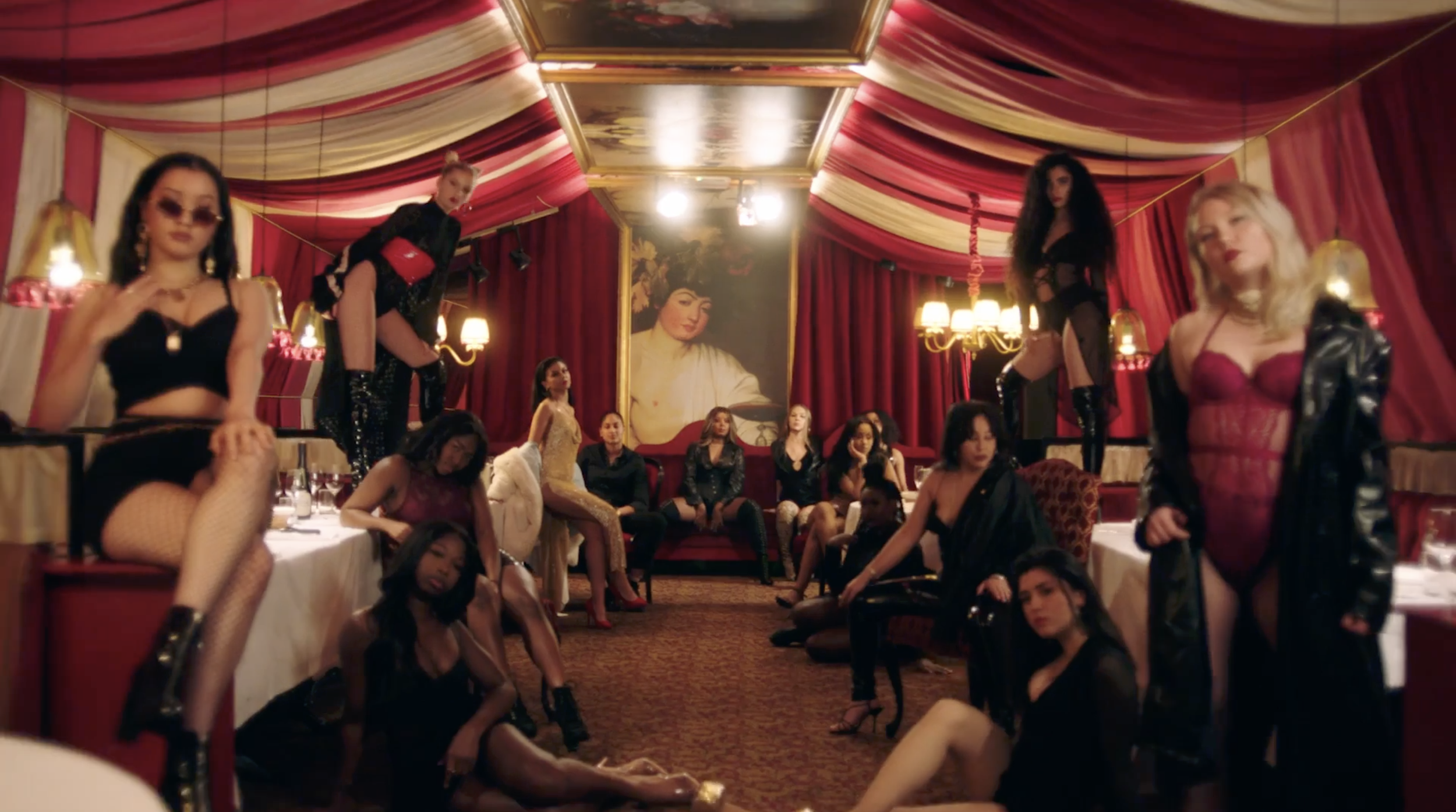 Still picture from the musicvideo Aah Shit with Imenella, a lot of women in empowering outfits