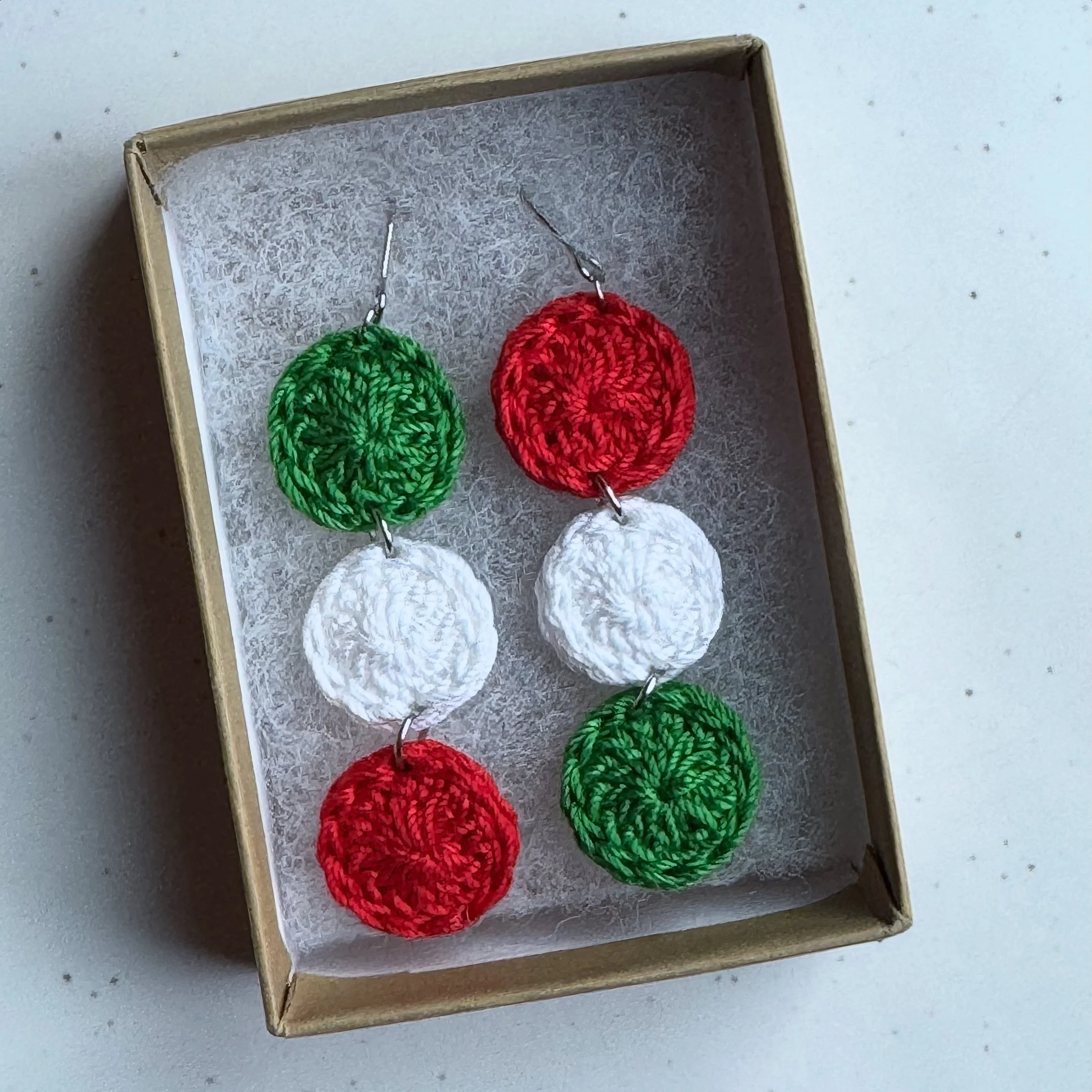 red, white, and green dangles