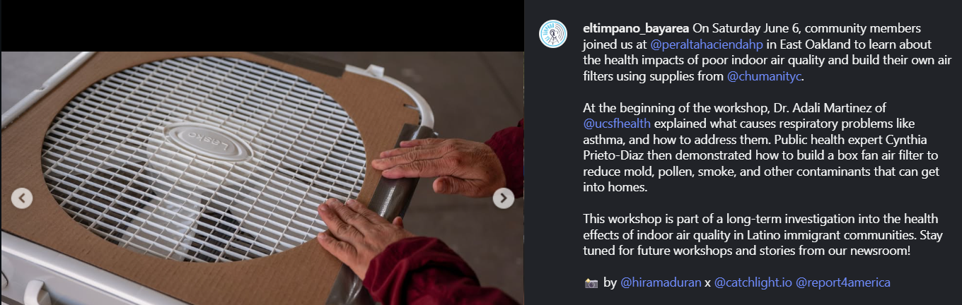 A screenshot of El Tímpano's post, click here to access the text. The image is of two hands applying duct tape to attach a cardboard exhaust shroud to the front of a box fan.