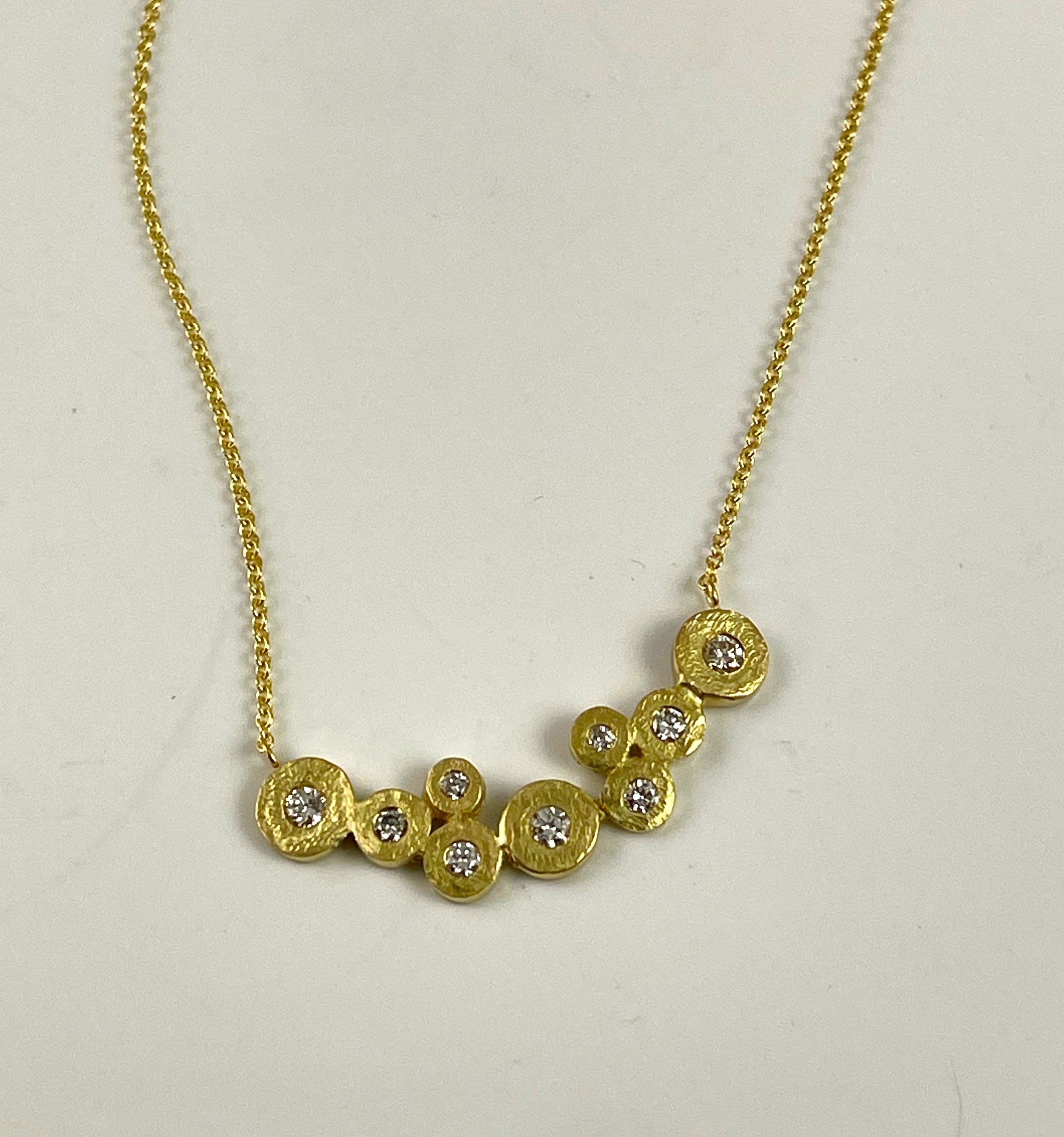 For Wendy. Her diamonds are set in an 18K Quarry Bubble necklace.